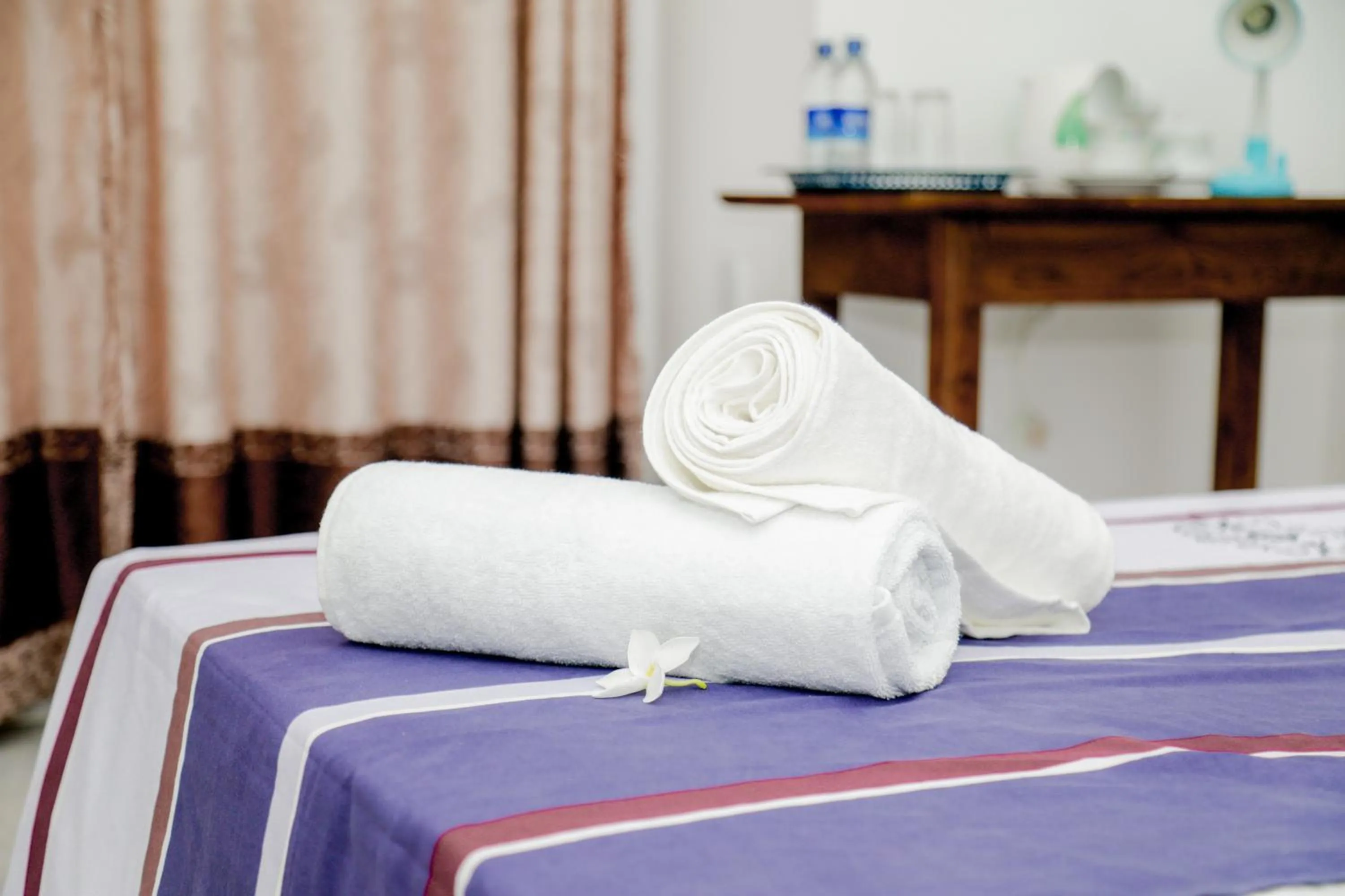 Bed in Araliya Lagoon Park Resort