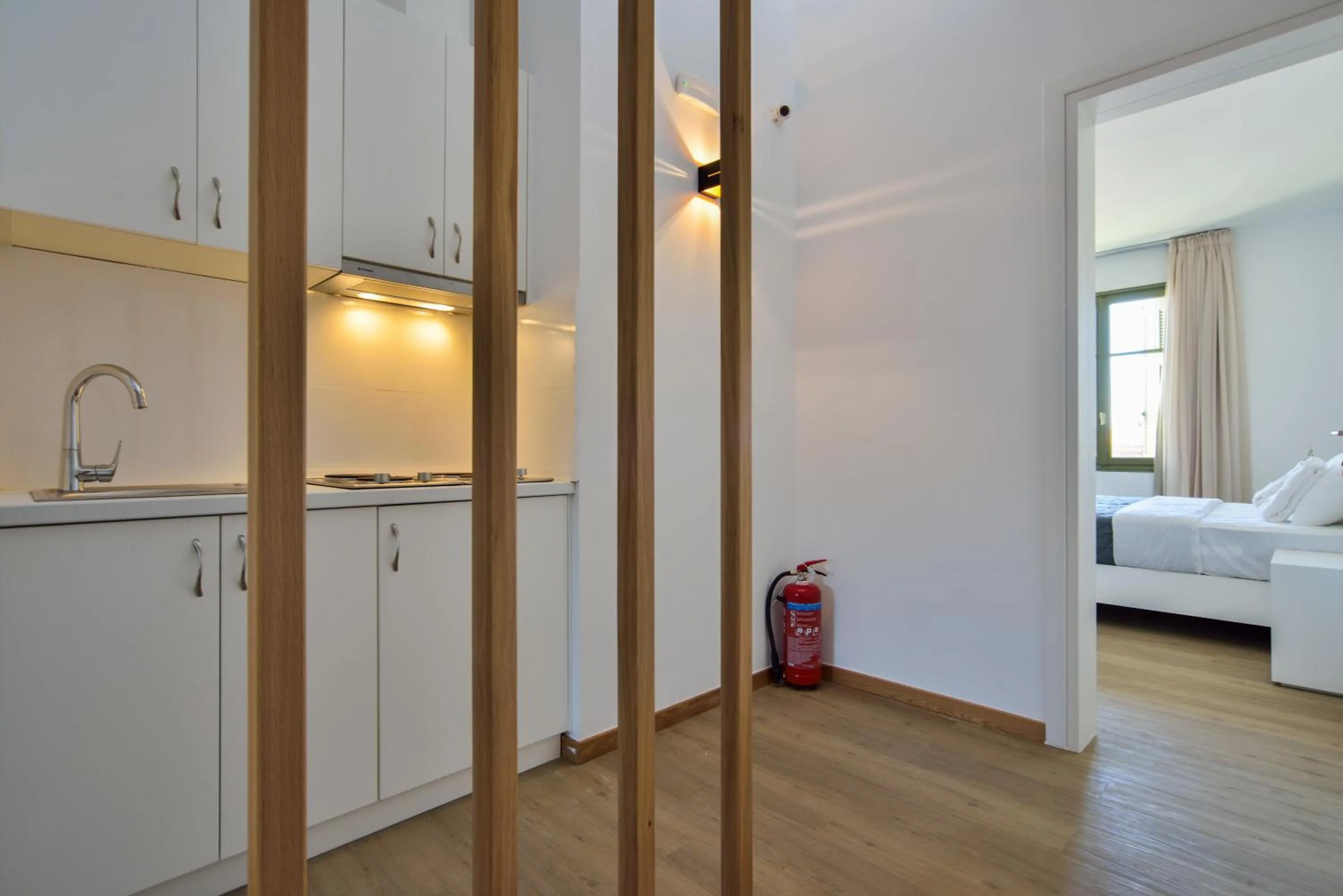 Kitchen or kitchenette, Bed in Elia Portou Luxury Residence