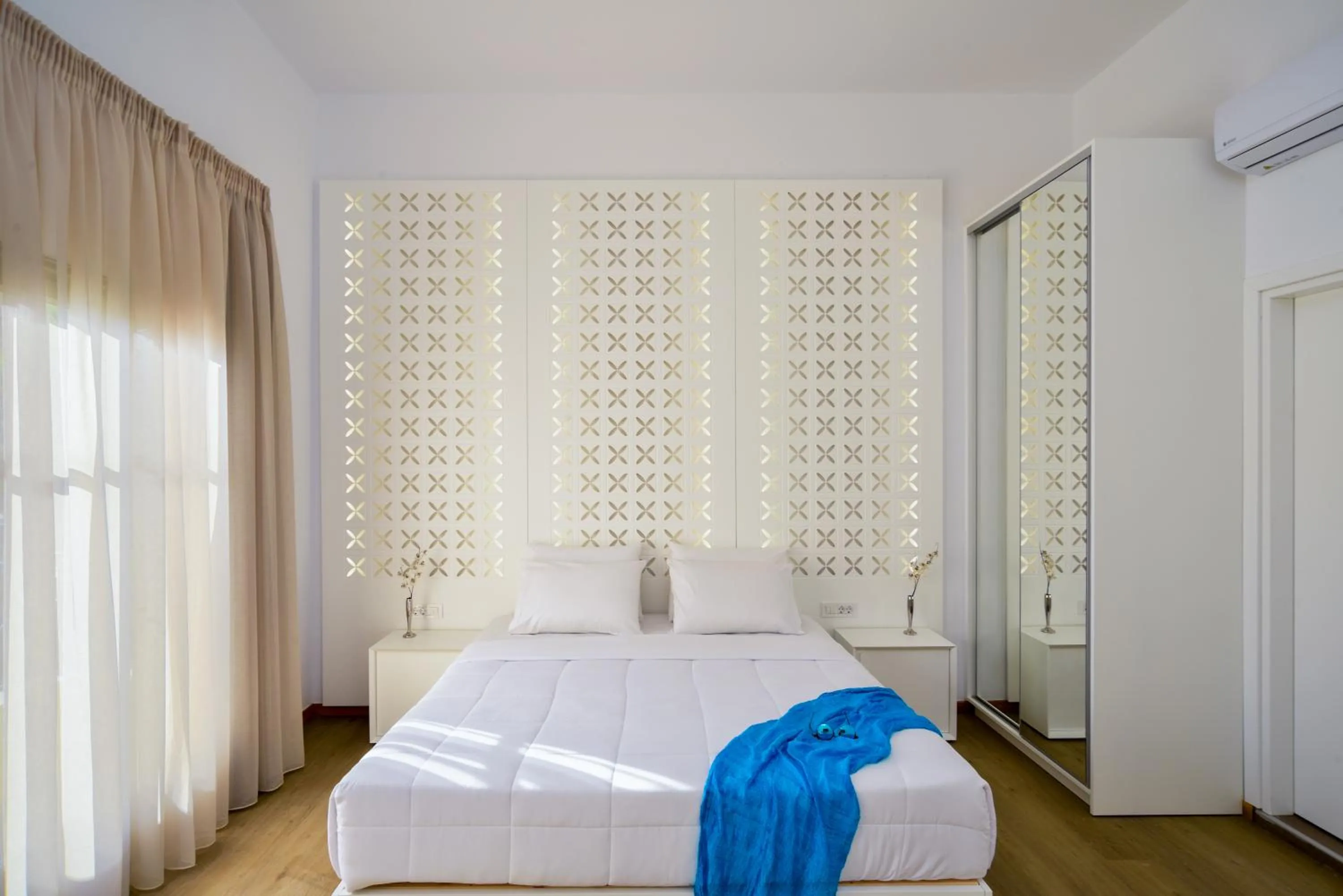 Bed in Elia Portou Luxury Residence