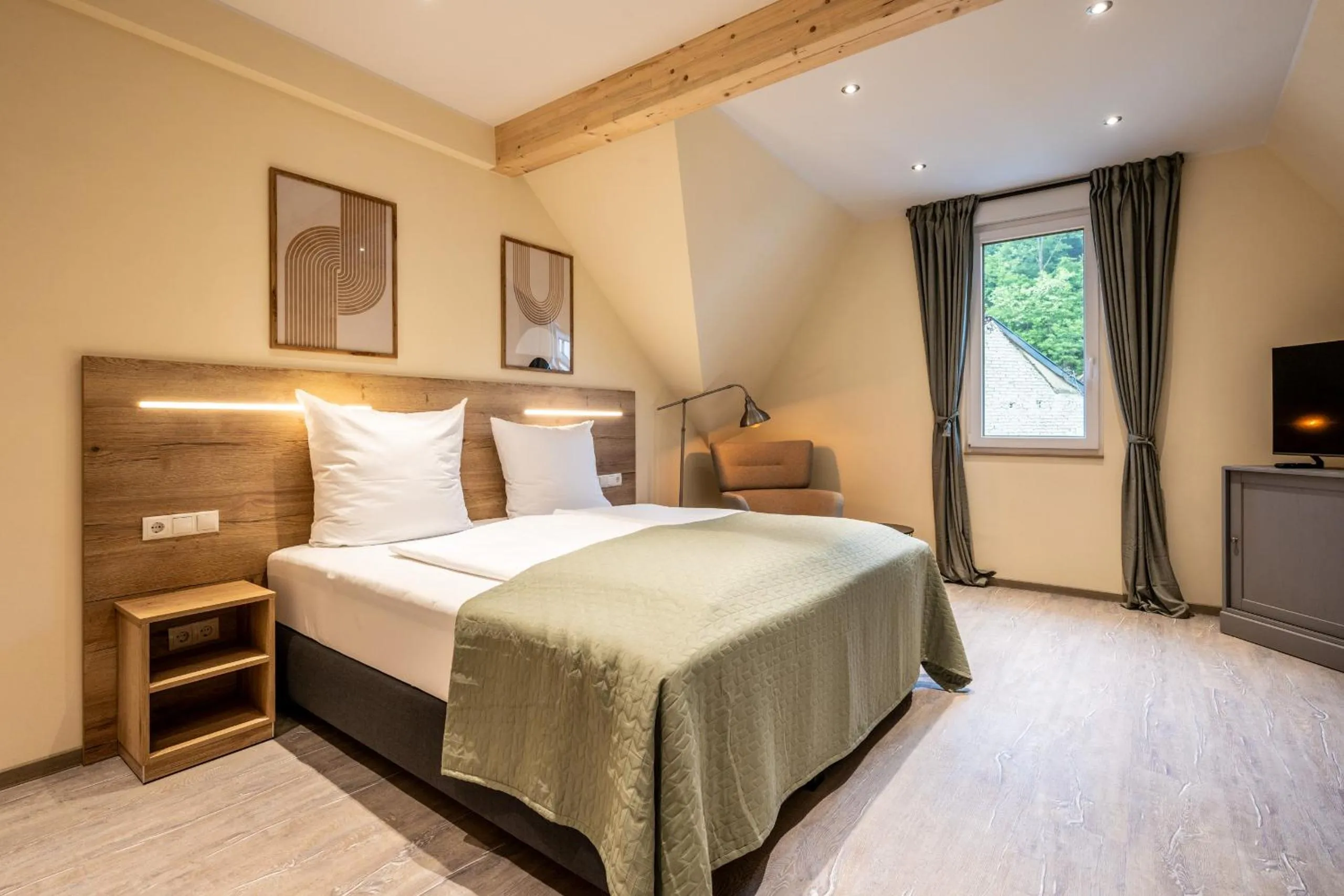 Bed in Apart Hotel Lang