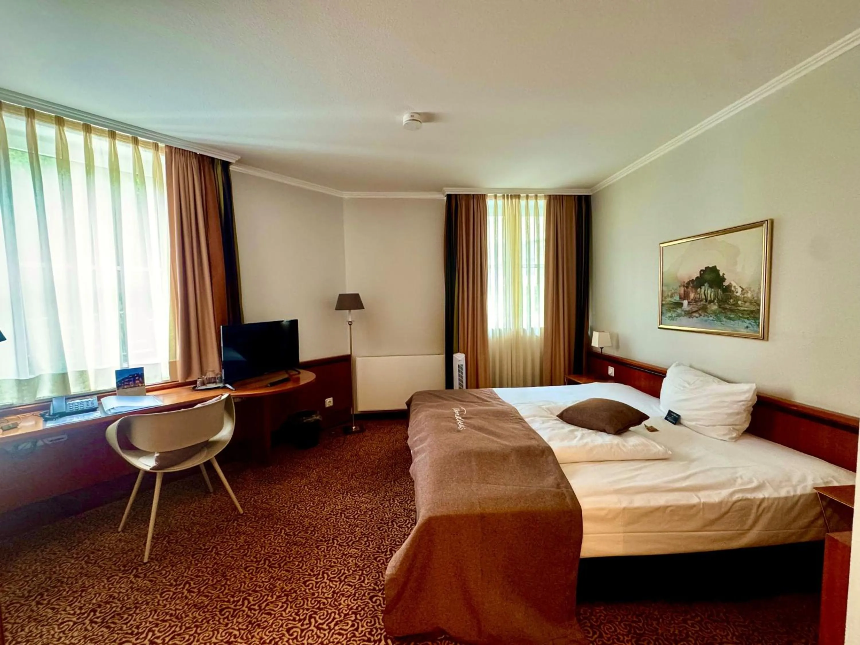 Living room, Bed in Tandreas Hotel & Restaurant