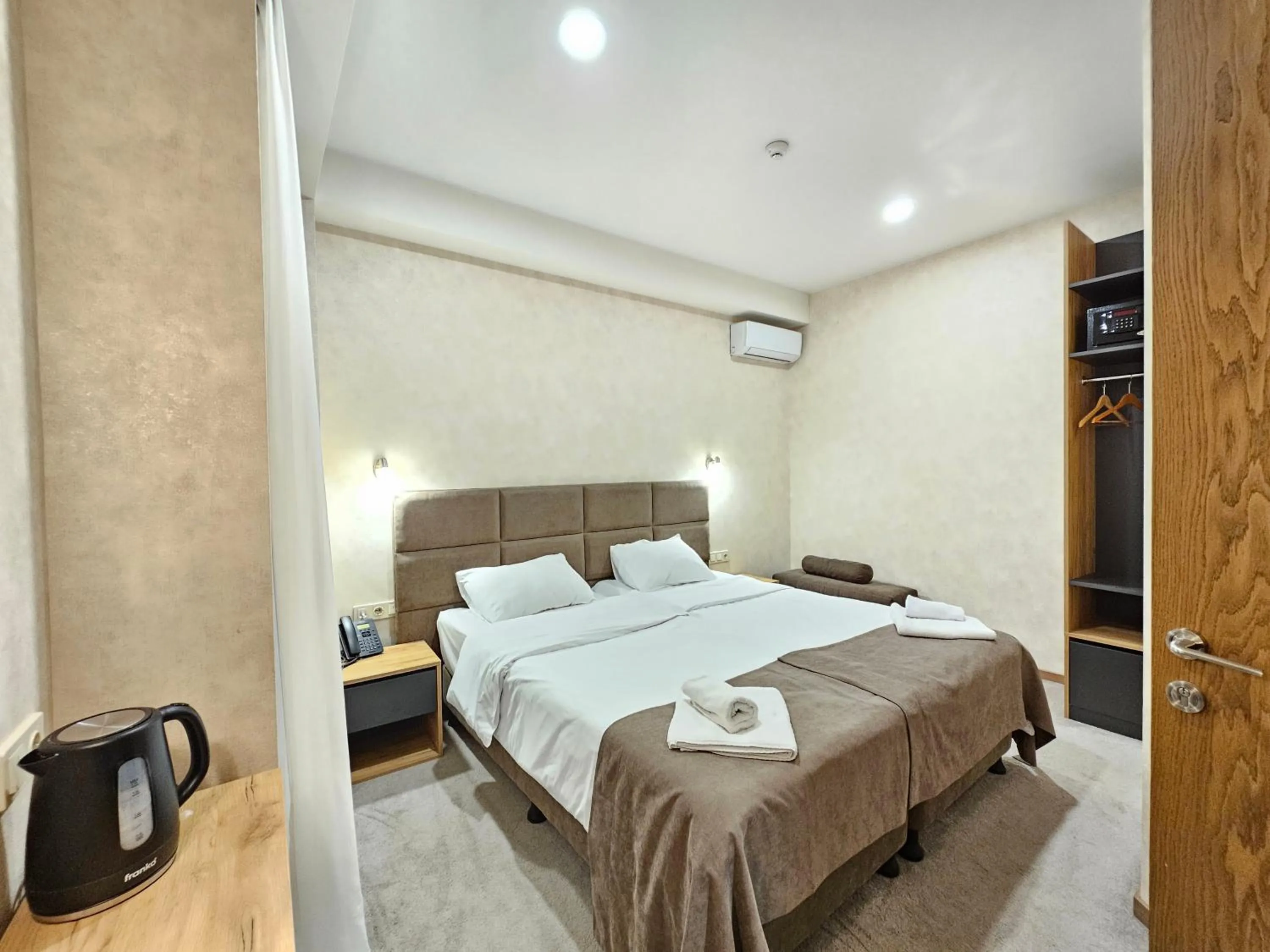 Bed in Brooch Boutique Hotel