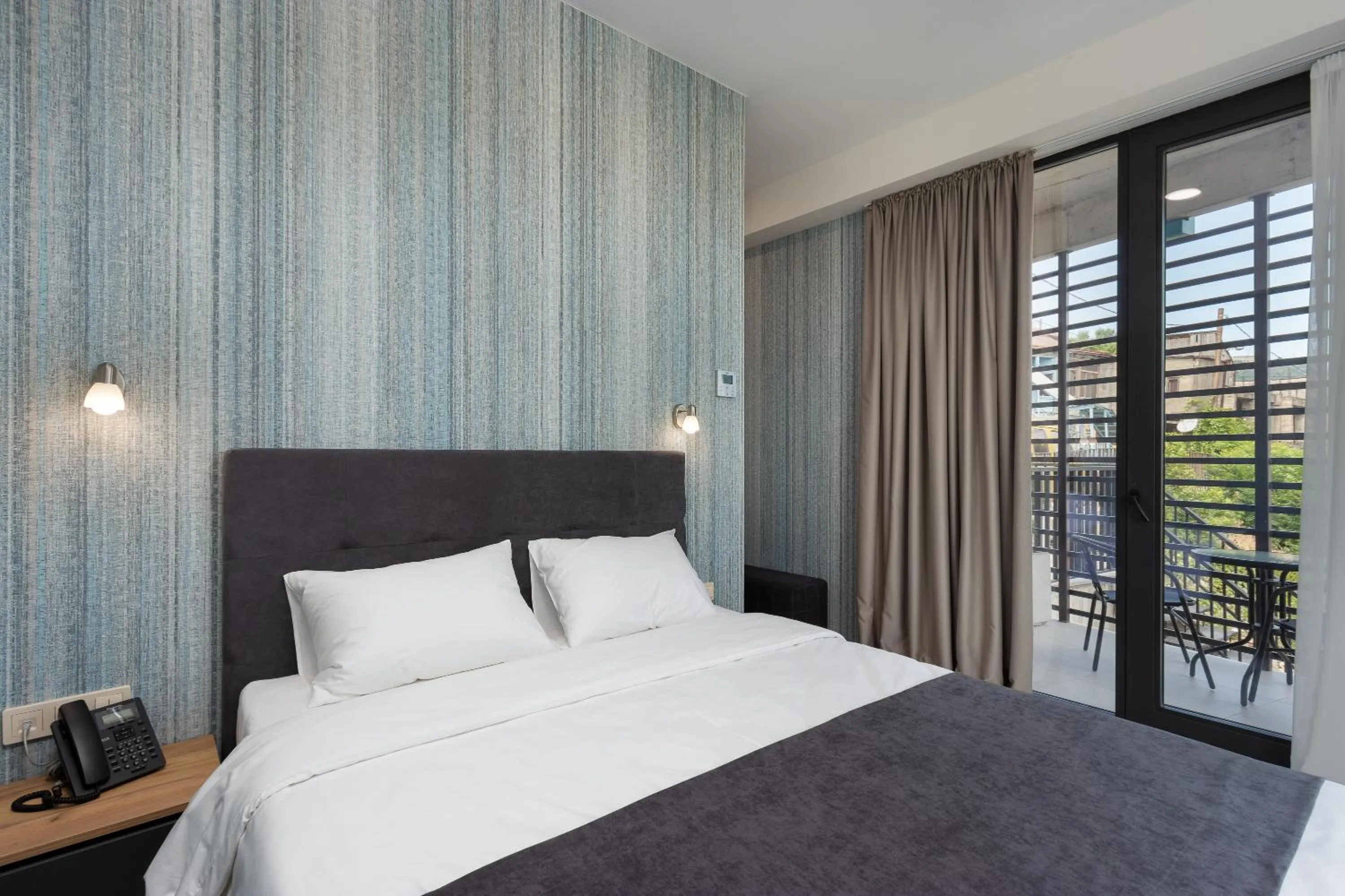 Bed in Brooch Boutique Hotel