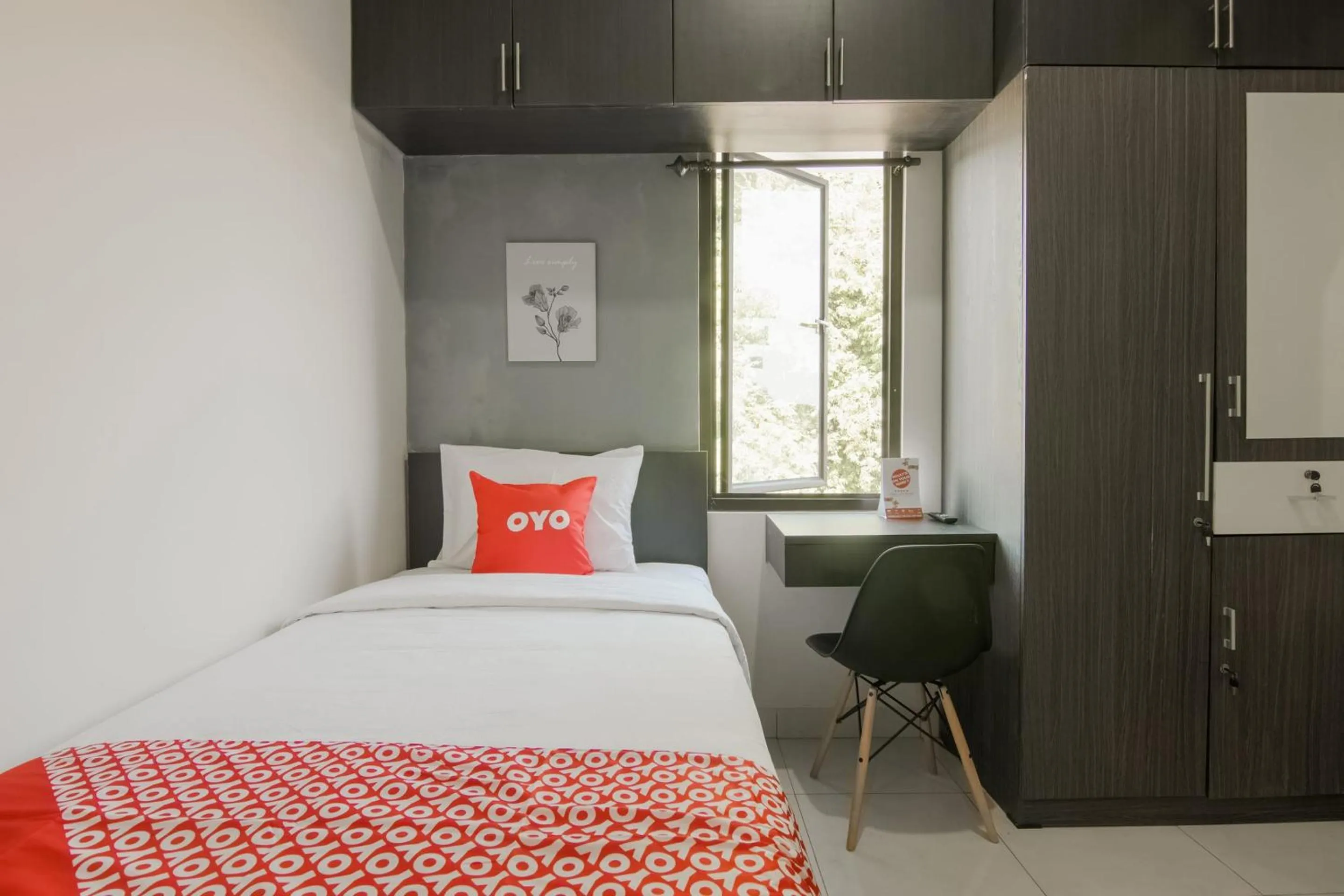 Bedroom, Bed in OYO 3826 Columbus Residence K11