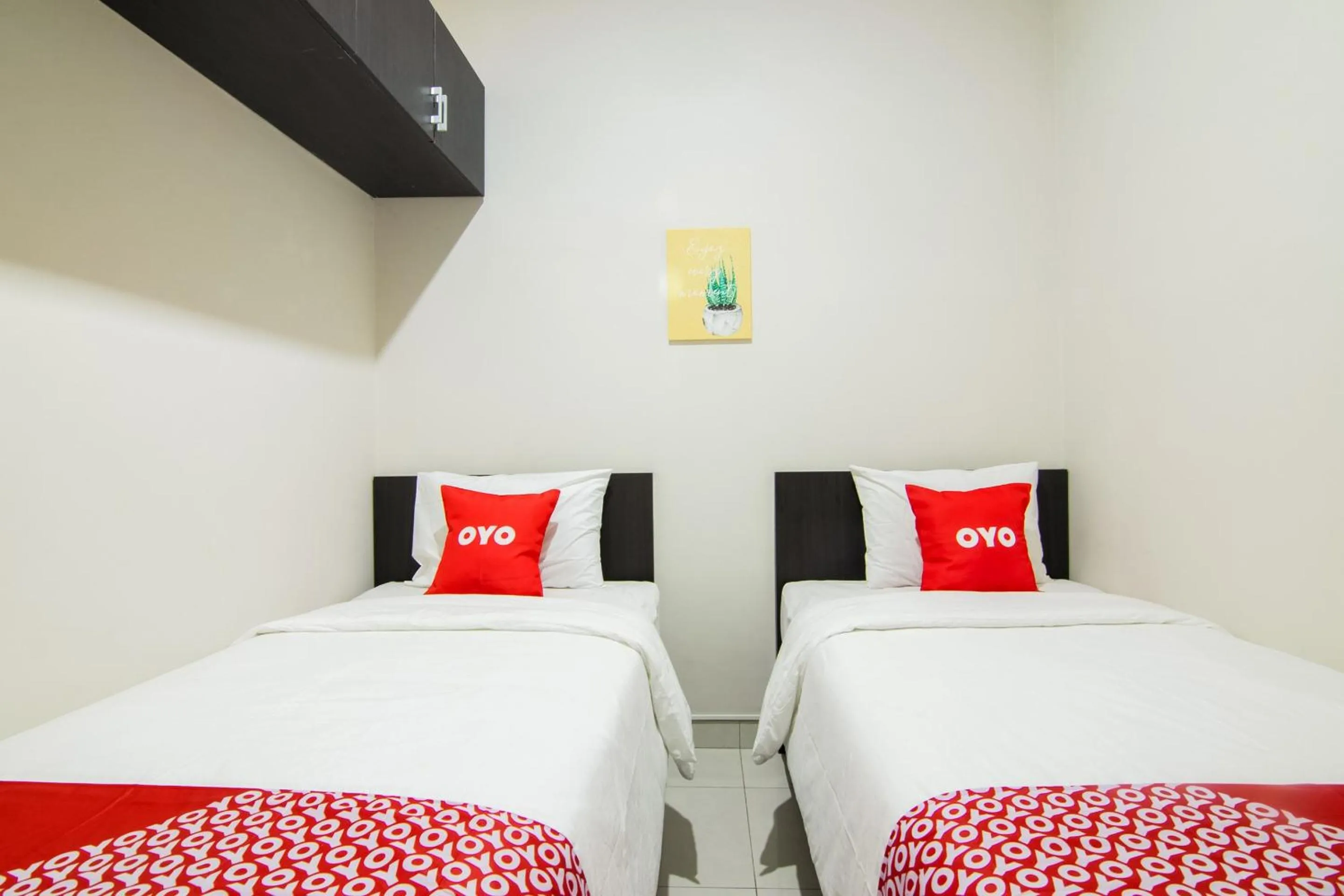 Bedroom, Bed in OYO 3826 Columbus Residence K11