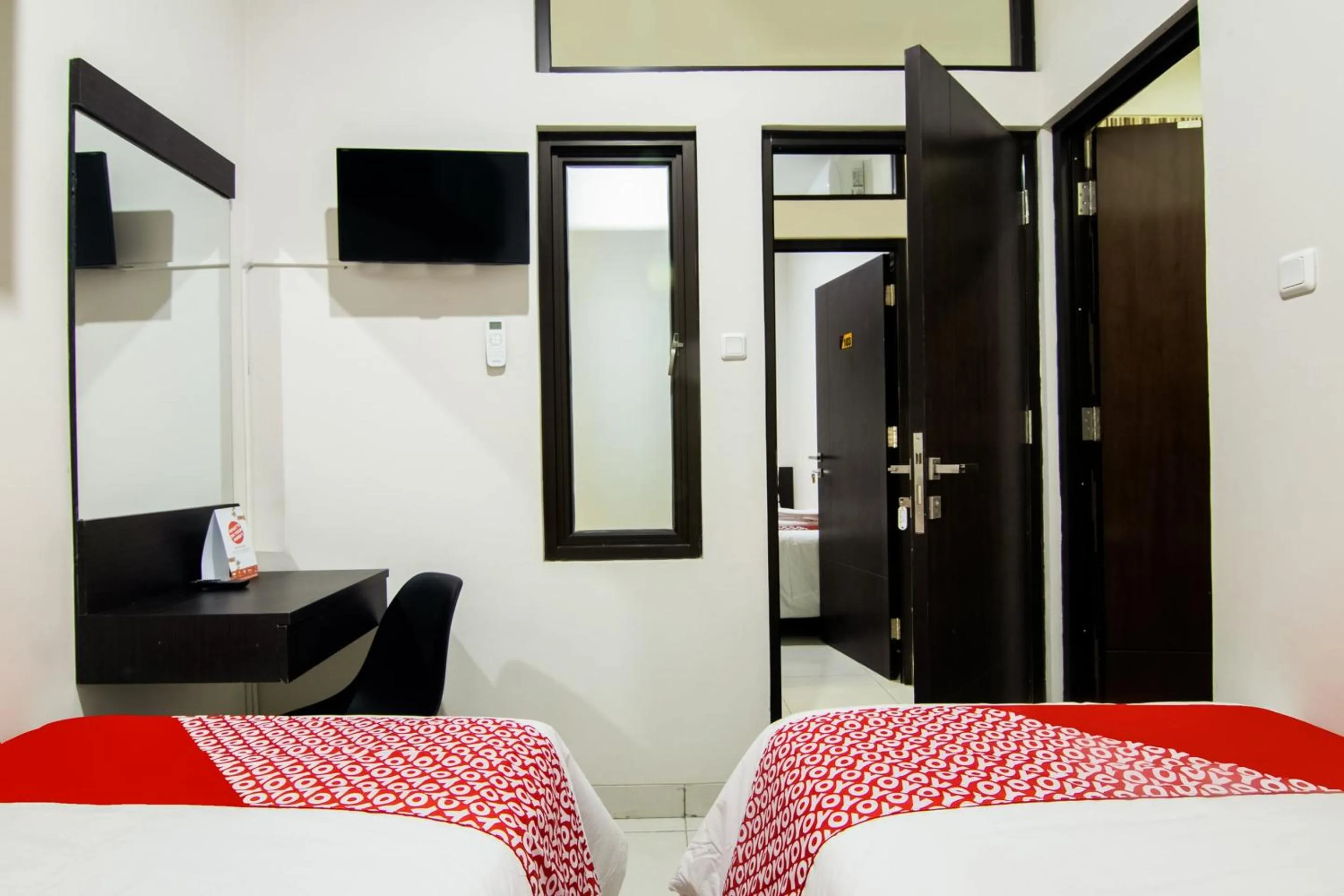 Bedroom, Bed in OYO 3826 Columbus Residence K11