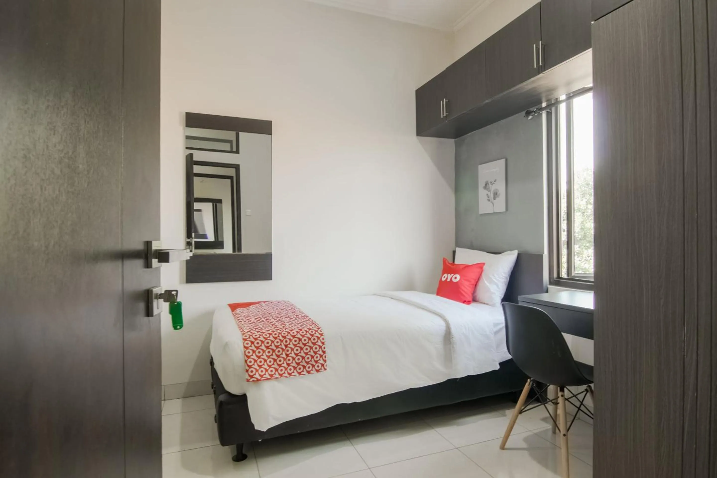 Bedroom, Bed in OYO 3826 Columbus Residence K11