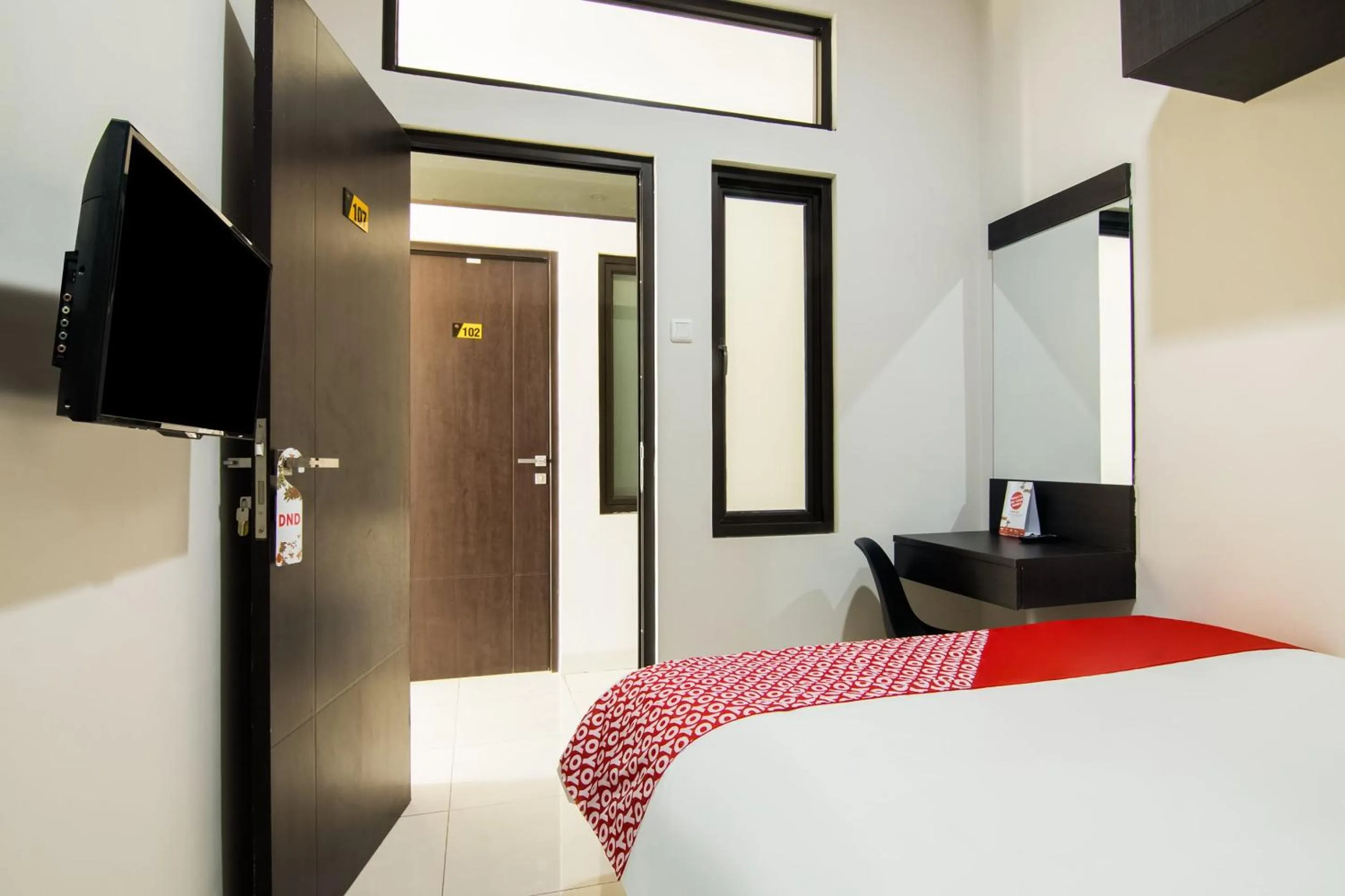 Bedroom, Bed in OYO 3826 Columbus Residence K11