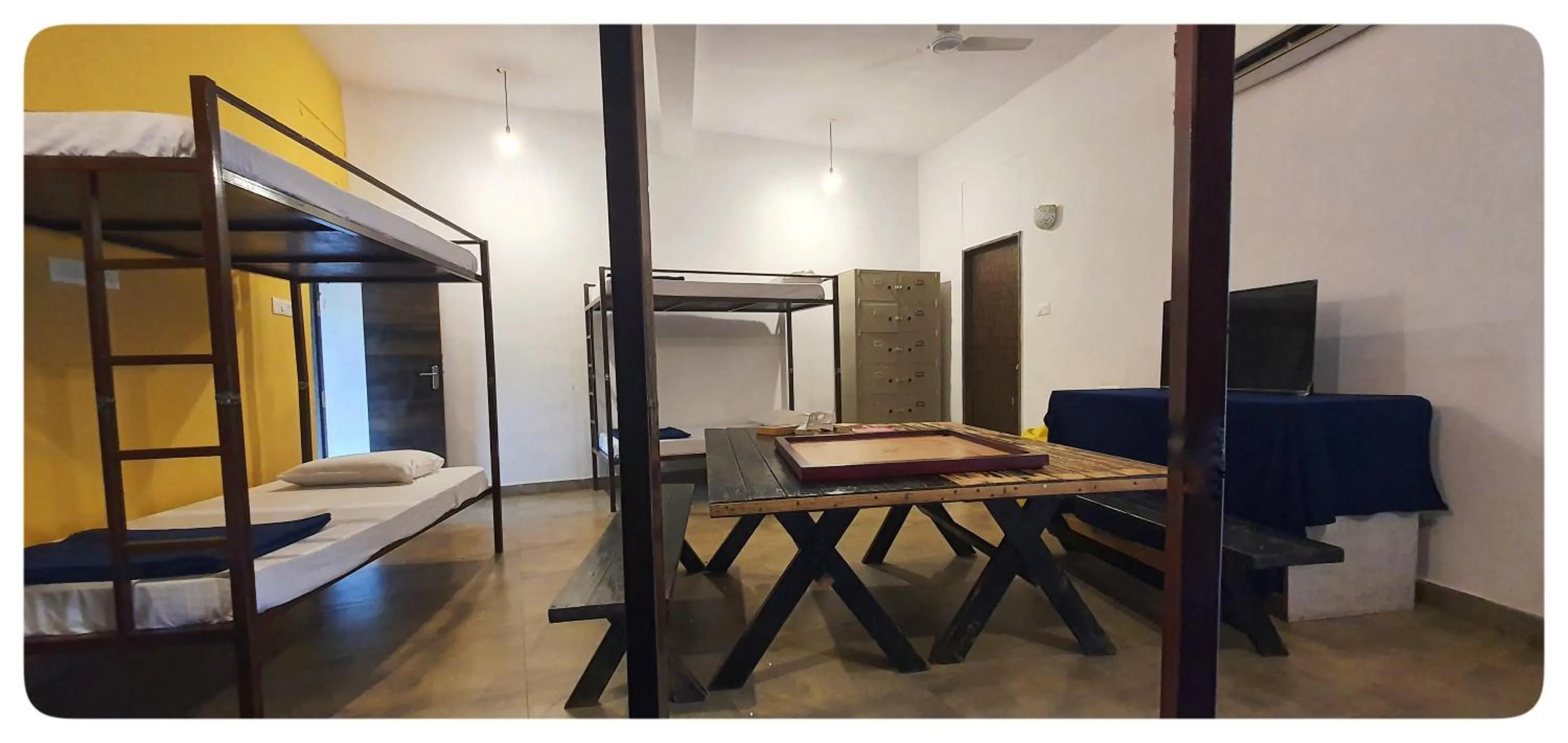 Seating area, Bed in Arthigamya Spa & Resort