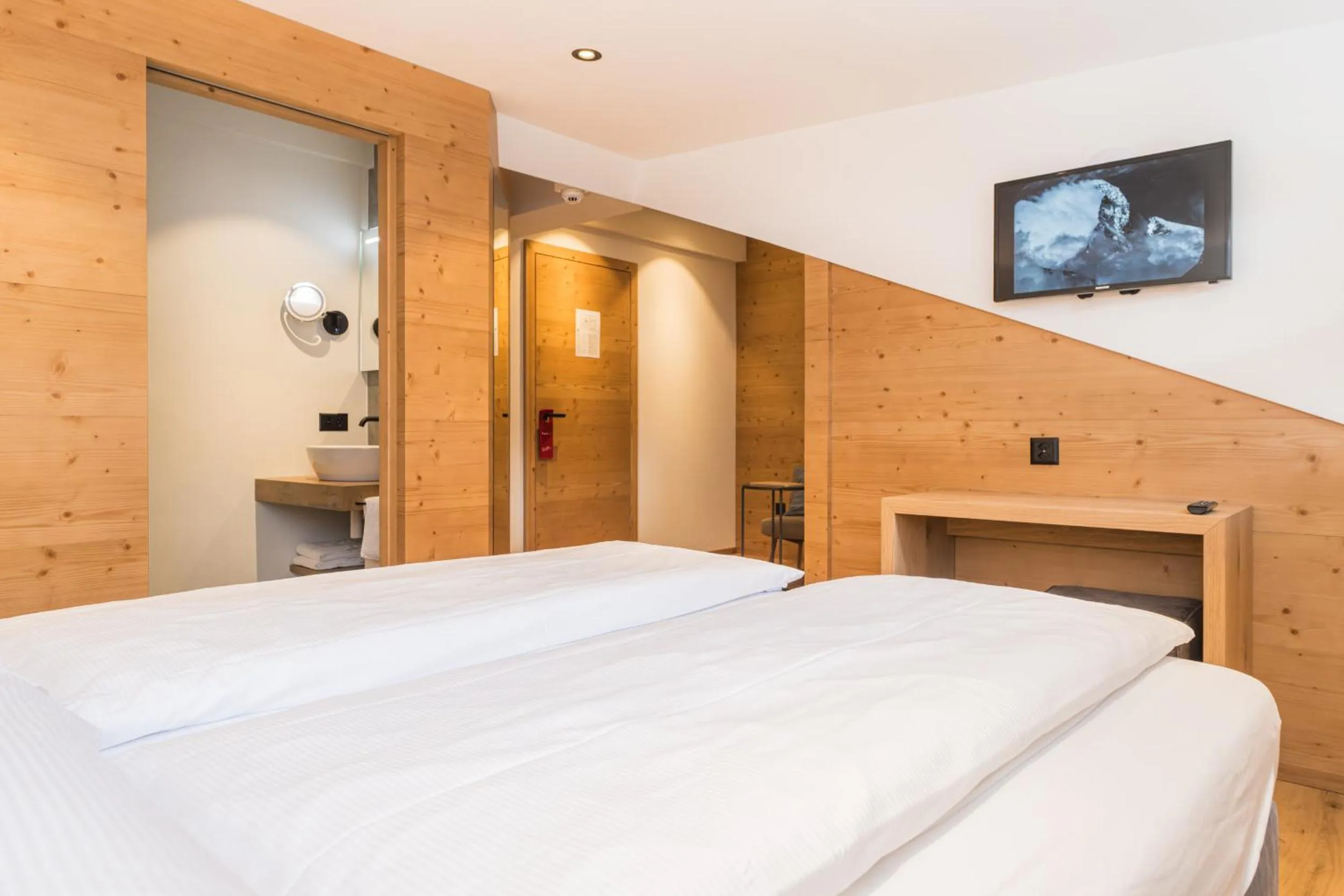 Bed in Hotel Bella Vista Zermatt