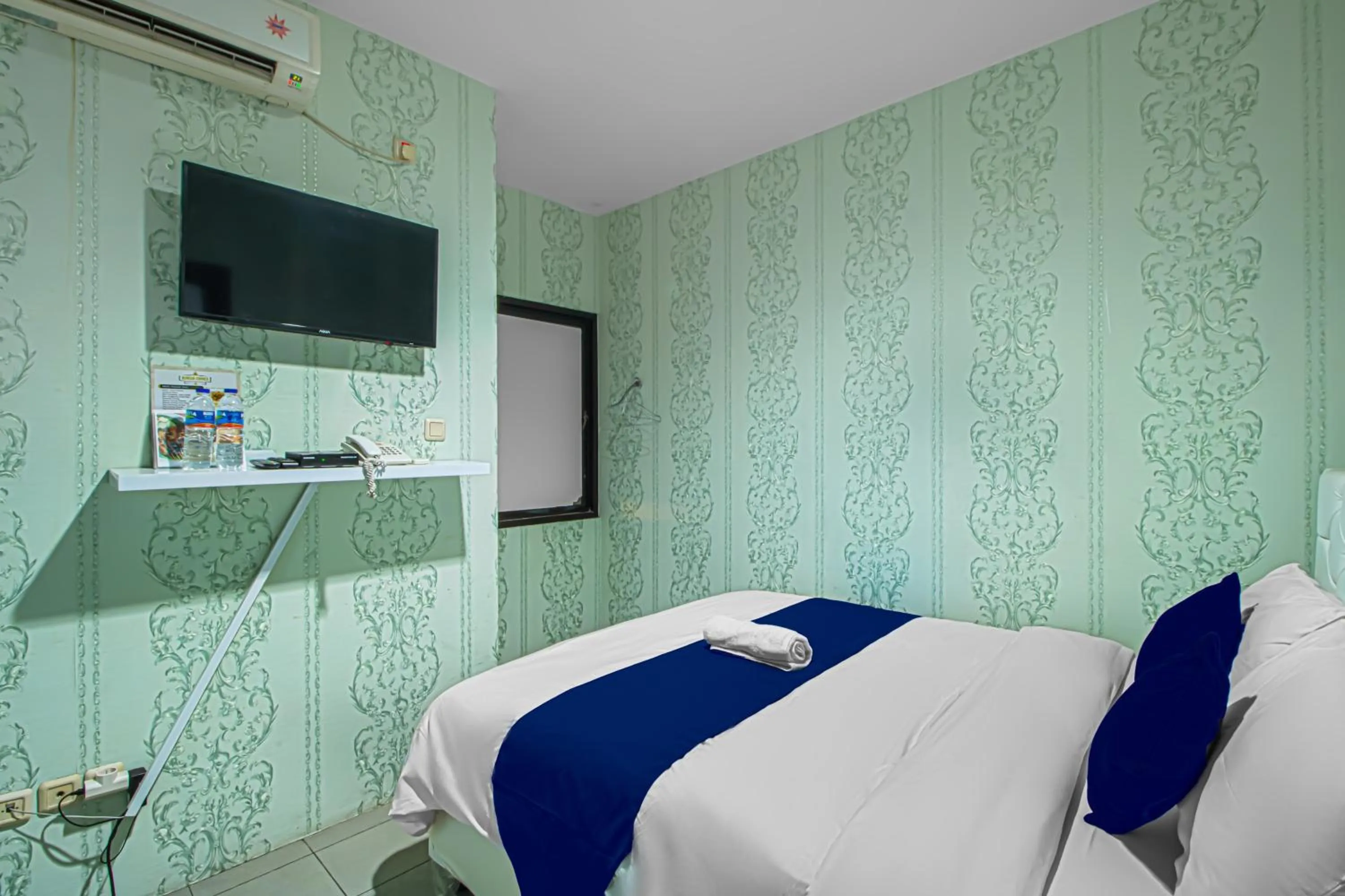 TV and multimedia, Bed in Bungur Inn Syariah