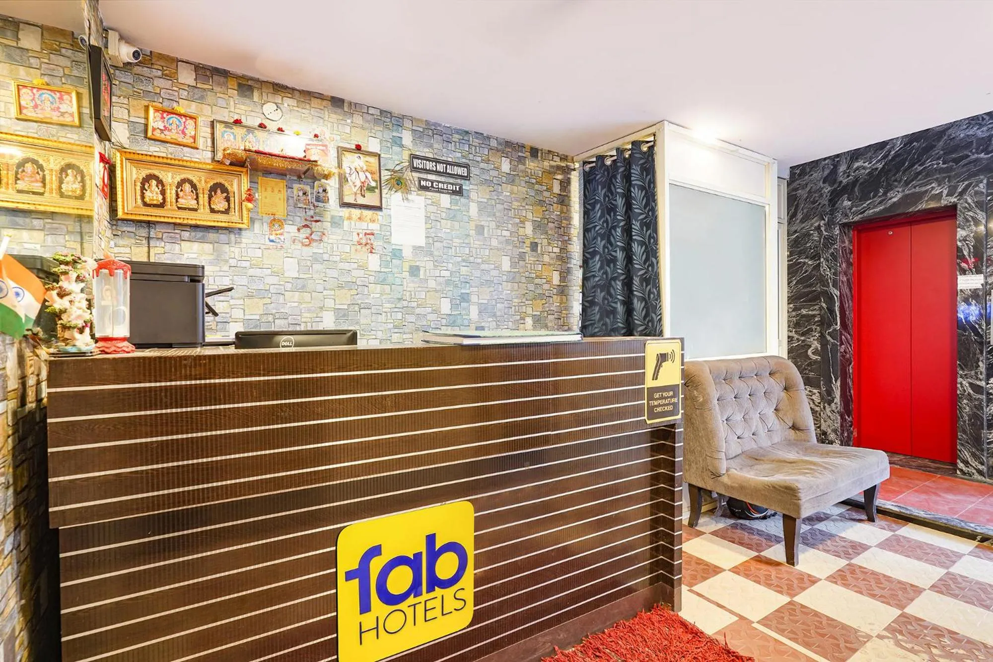 Lobby or reception in FabHotel Kings Suites Banaswadi