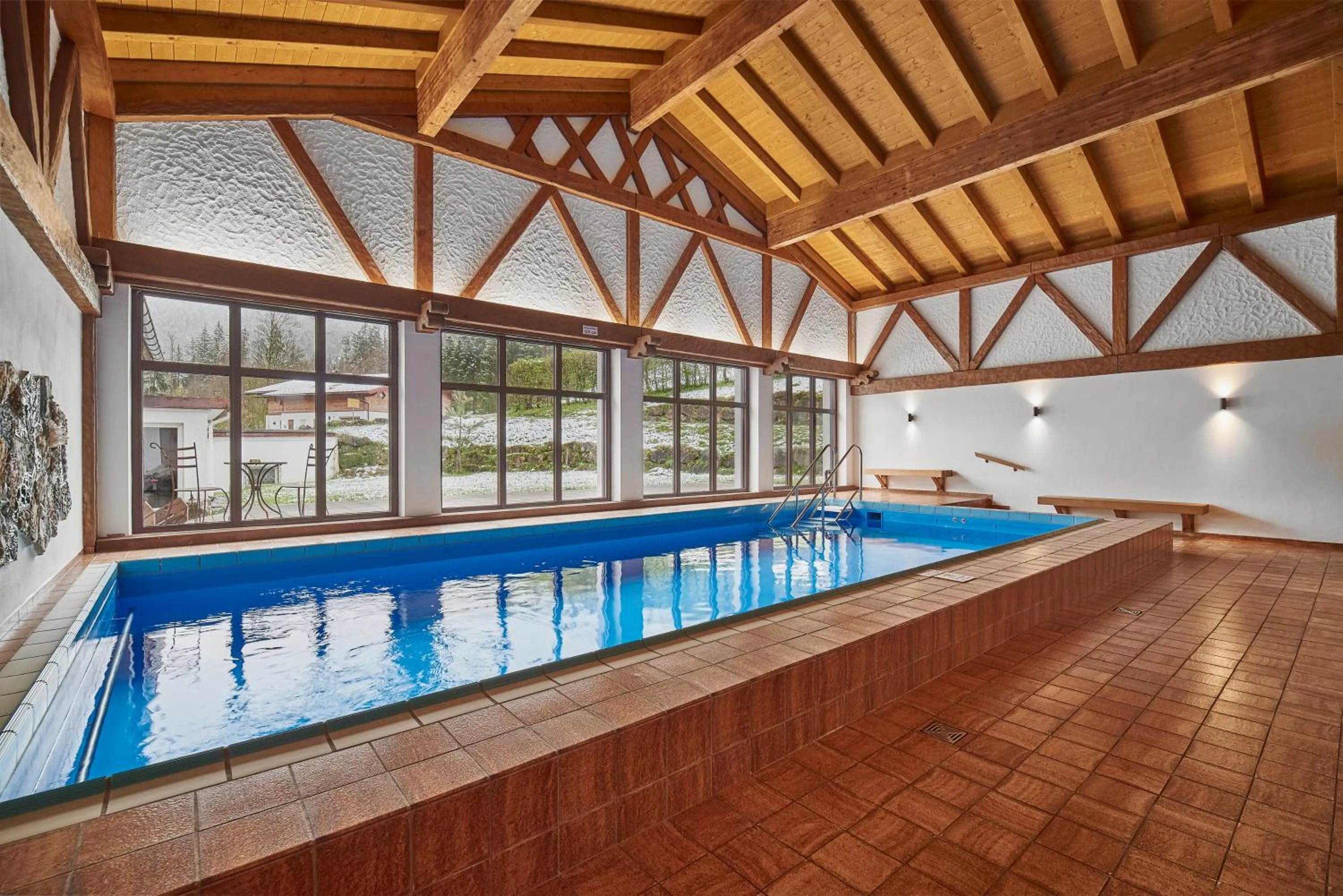 Swimming pool in Aktivhotel & Gasthof Schmelz Ihr familienfreundliches Urlaubs Hotel mit Wellness Almsauna ab Februar Chiemgau Karte