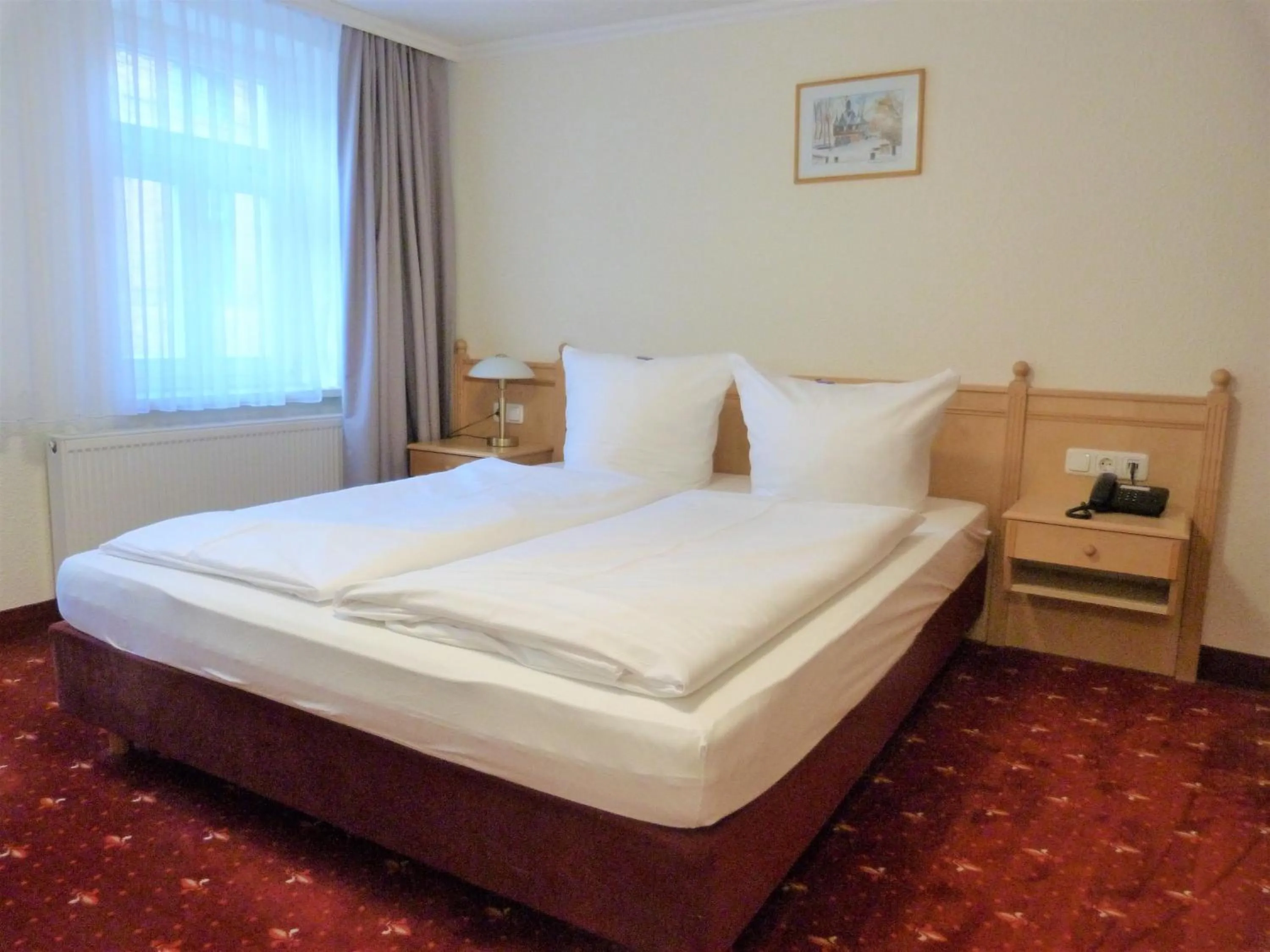 Photo of the whole room, Bed in Hotel Mühlhäuser Hof