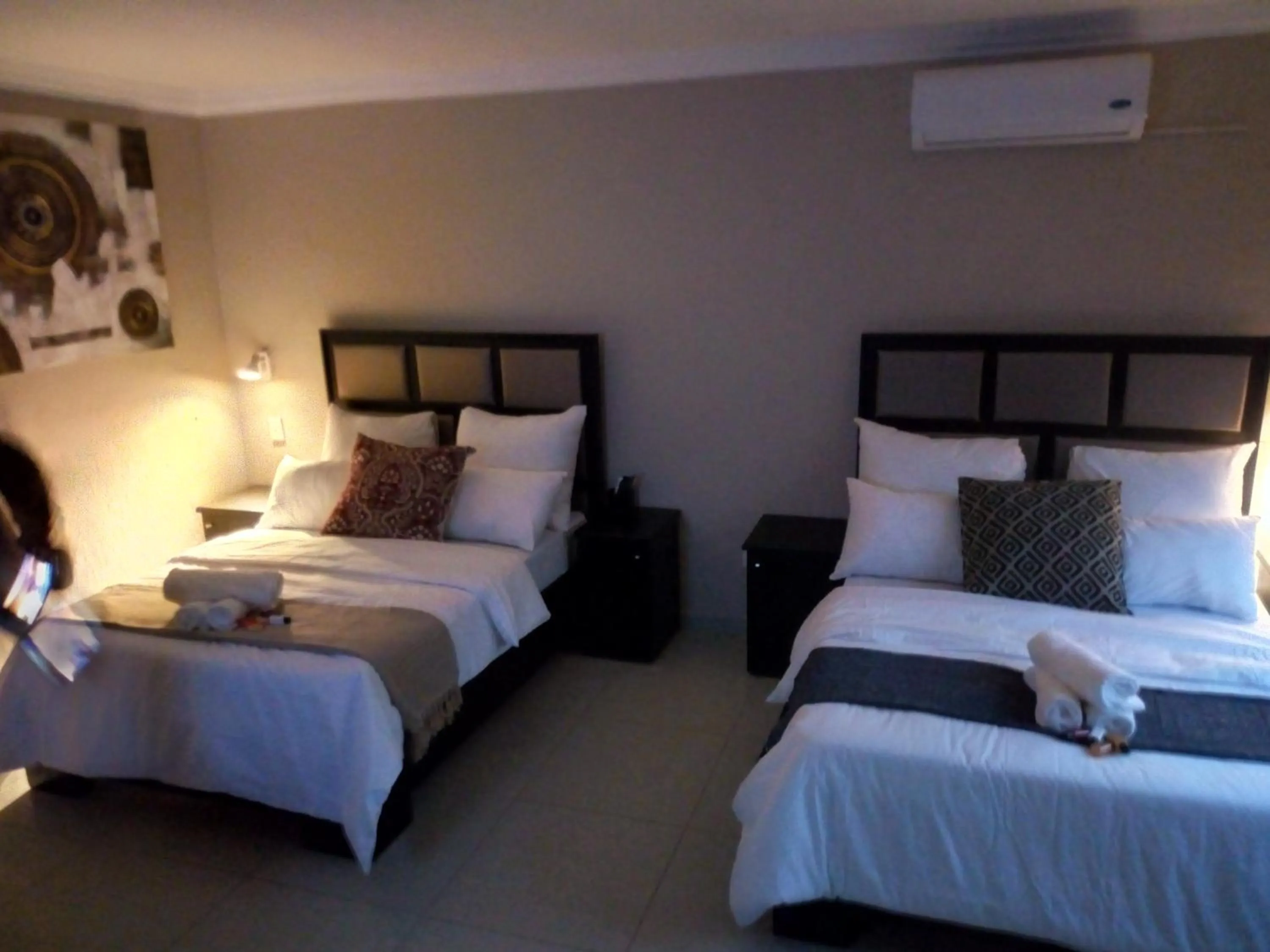 Bed in The Royal Prime Guest Lodge