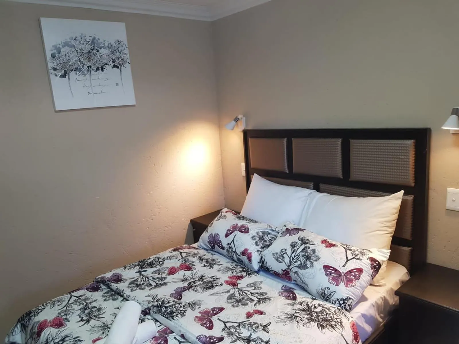 Bed in The Royal Prime Guest Lodge