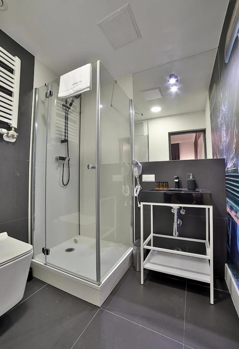 Shower in Saint Thomas Corner - by Upstairs