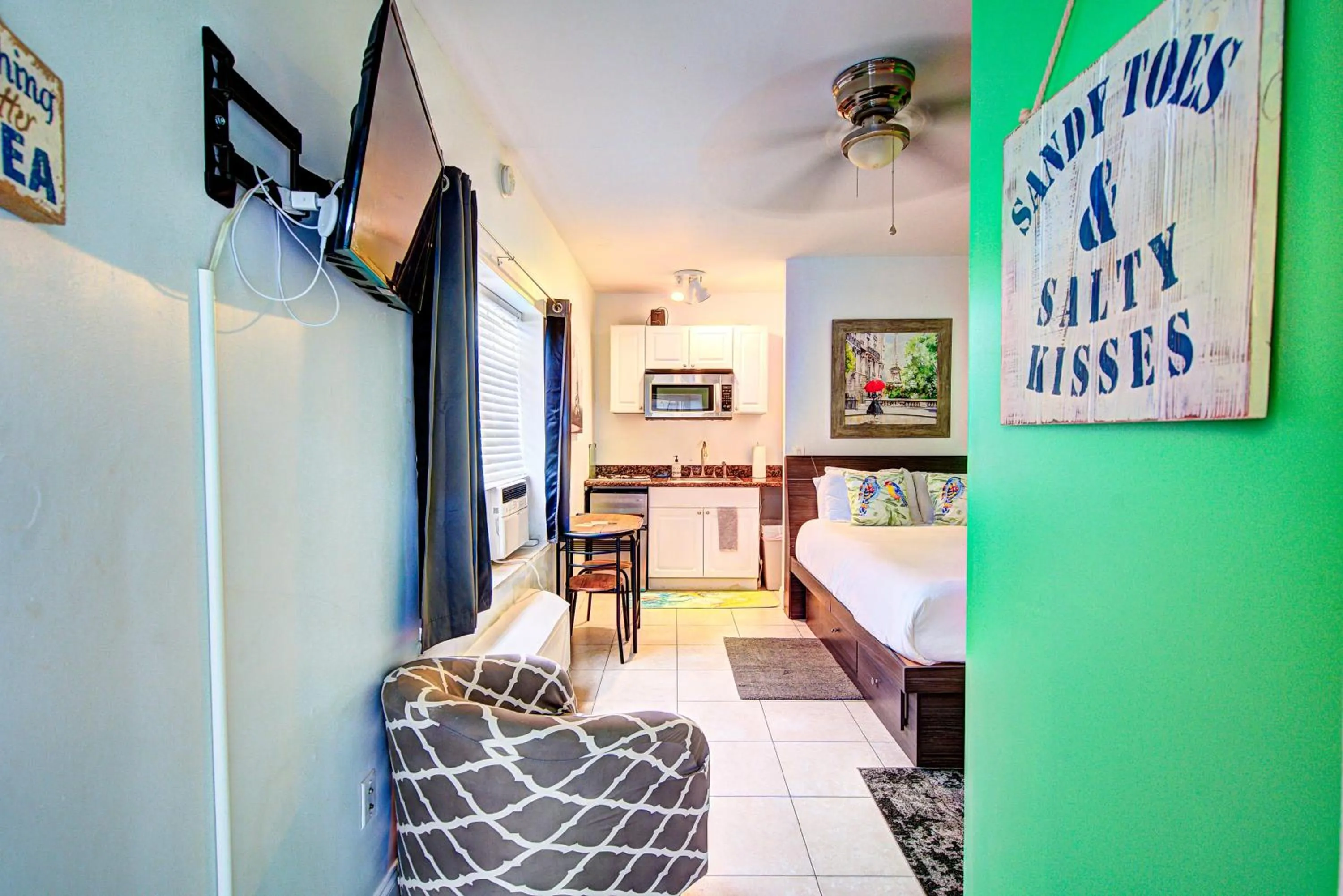 Photo of the whole room, Bed in Little Paris by the ocean self check in