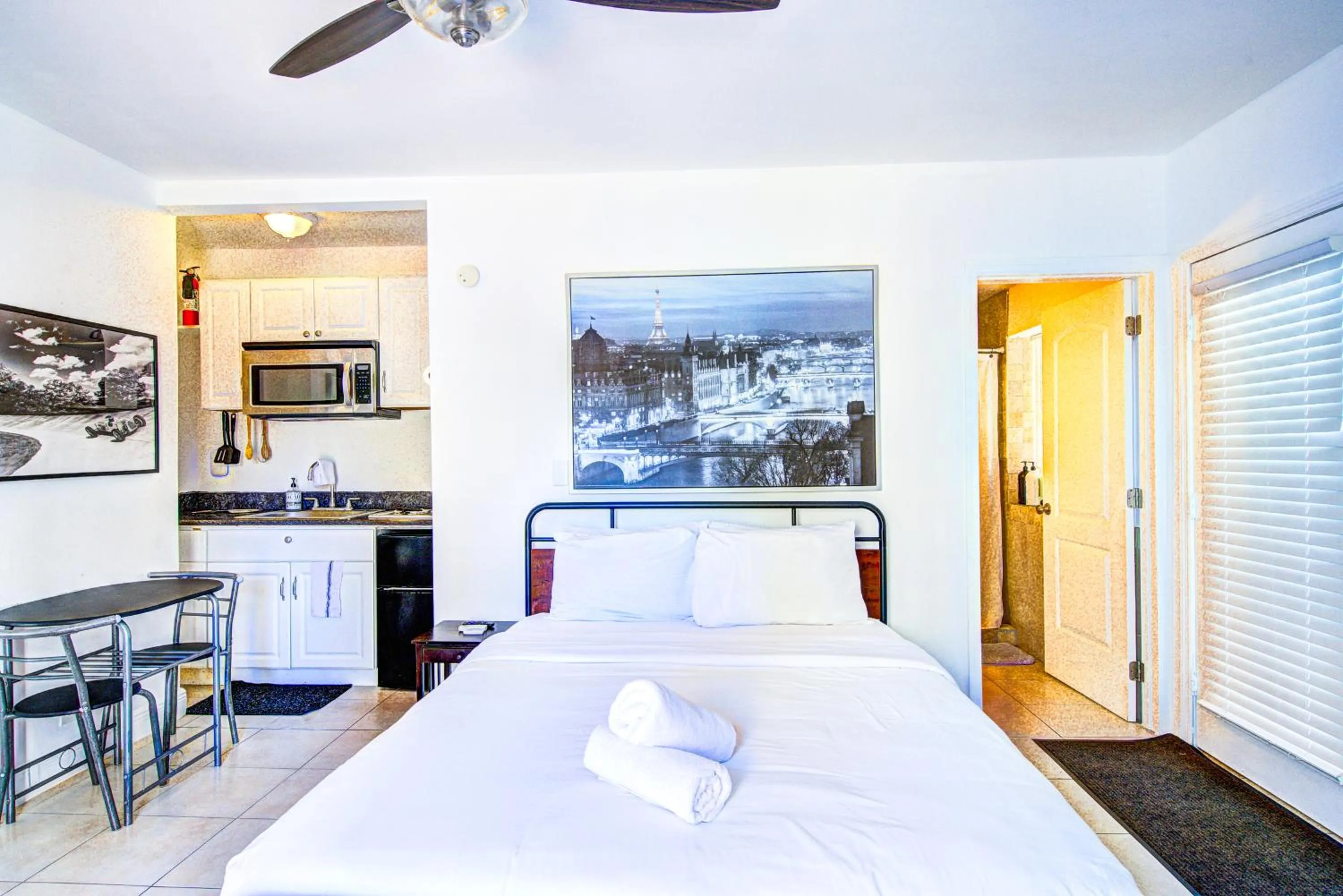 Bed in Little Paris by the ocean self check in