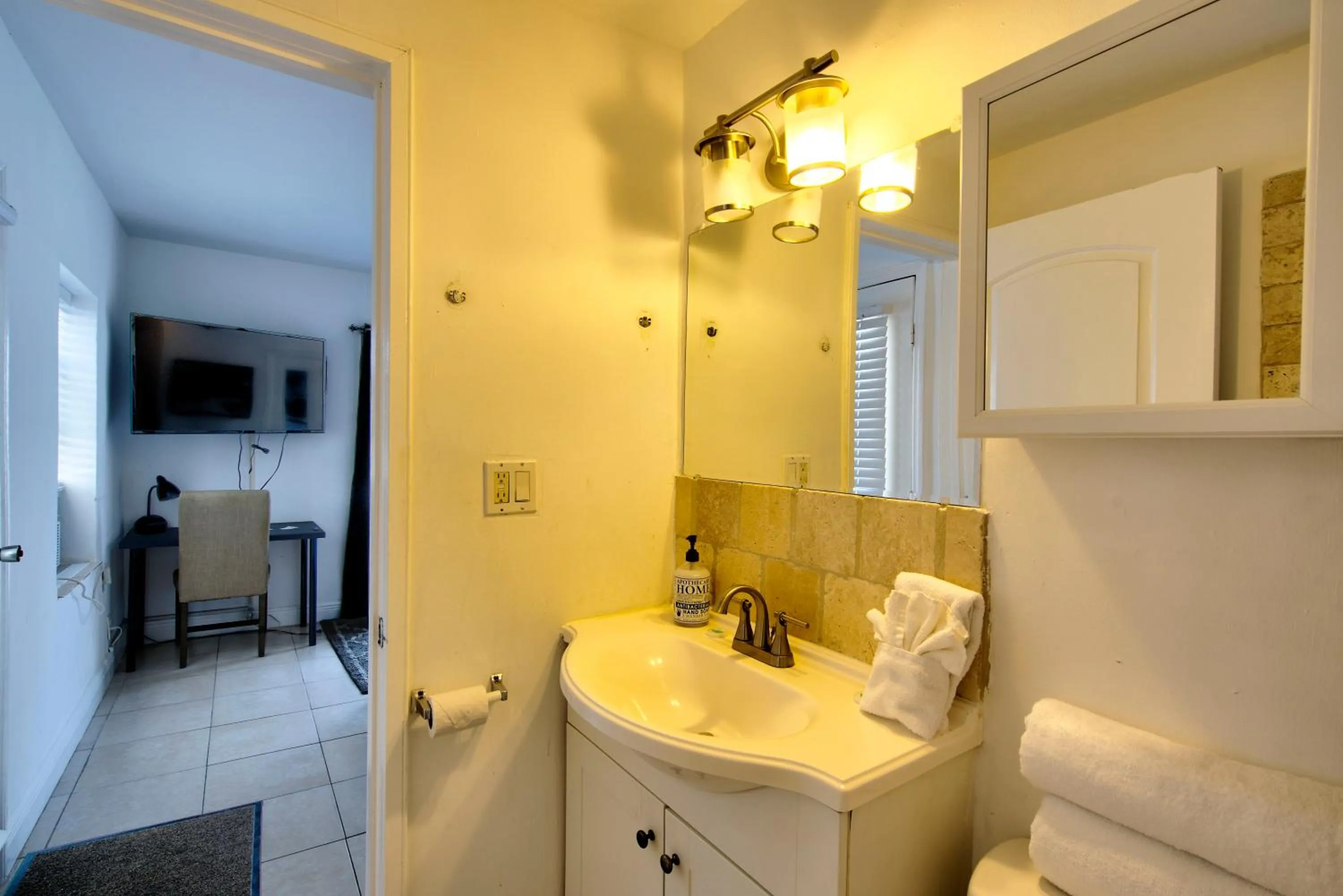 Bathroom in Little Paris by the ocean self check in