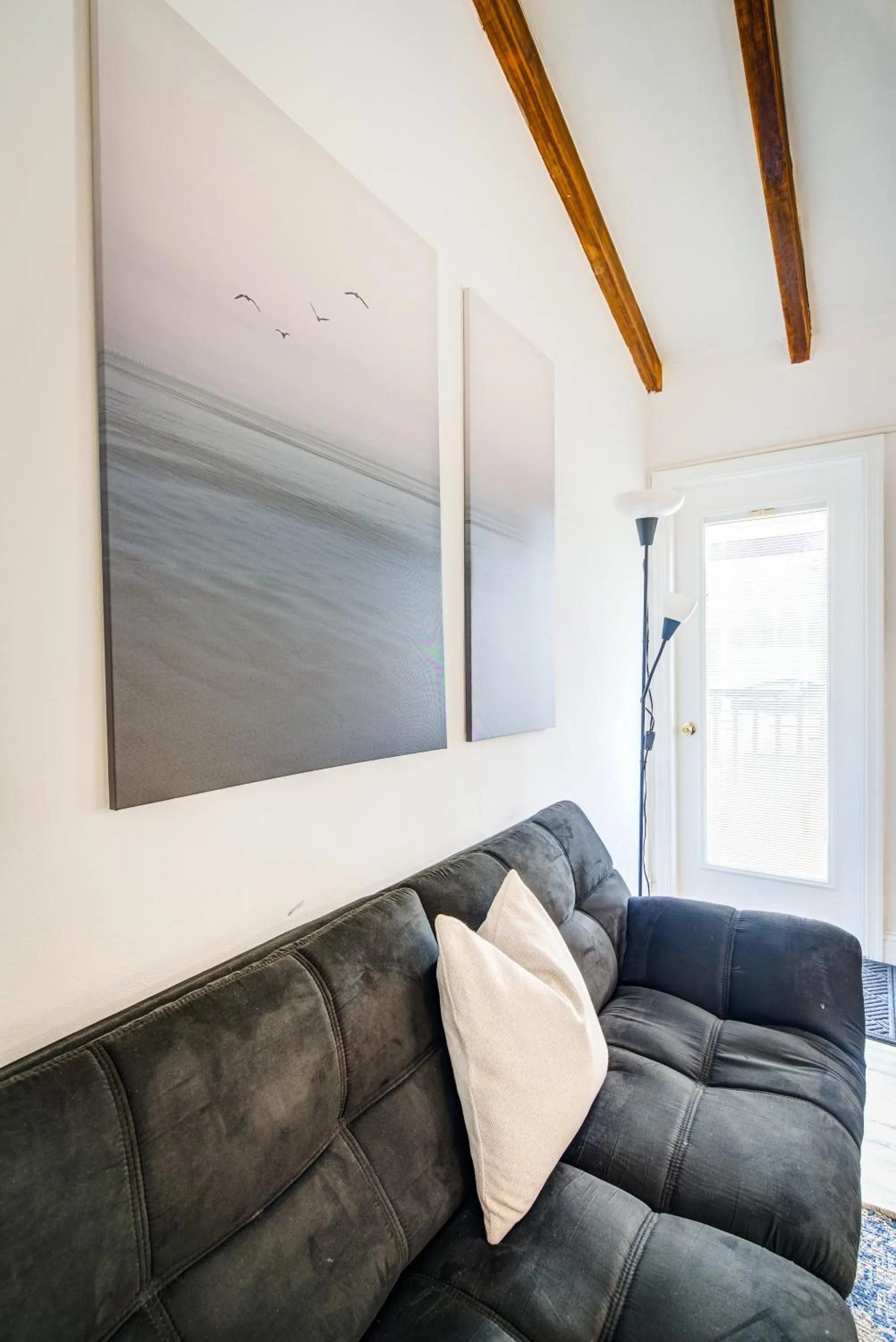 Seating area in Little Paris by the ocean self check in