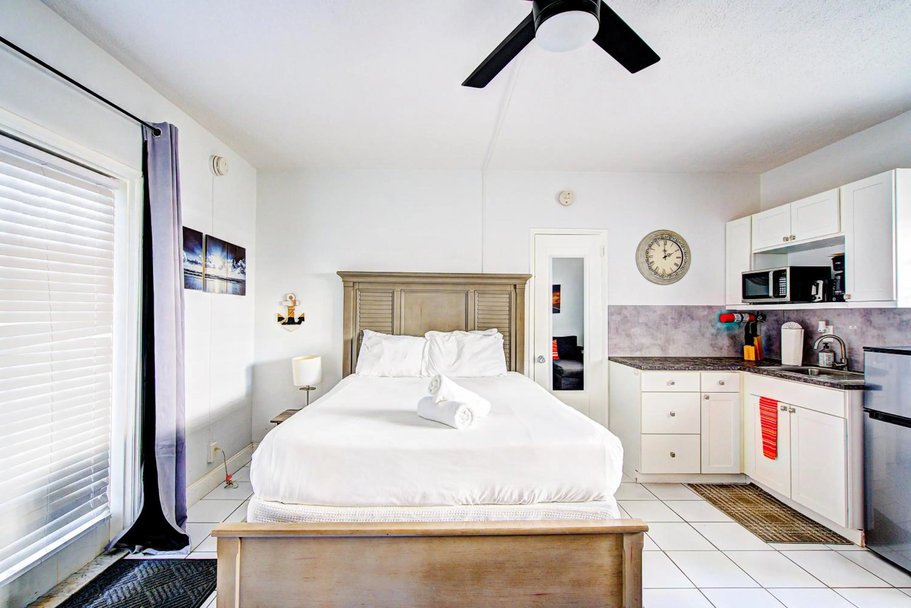 Bed in Little Paris by the ocean self check in