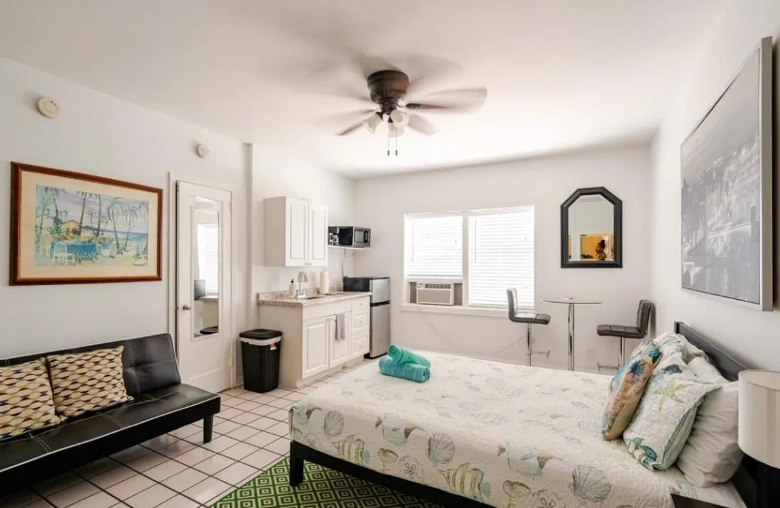 Photo of the whole room, Bed in Little Paris by the ocean self check in