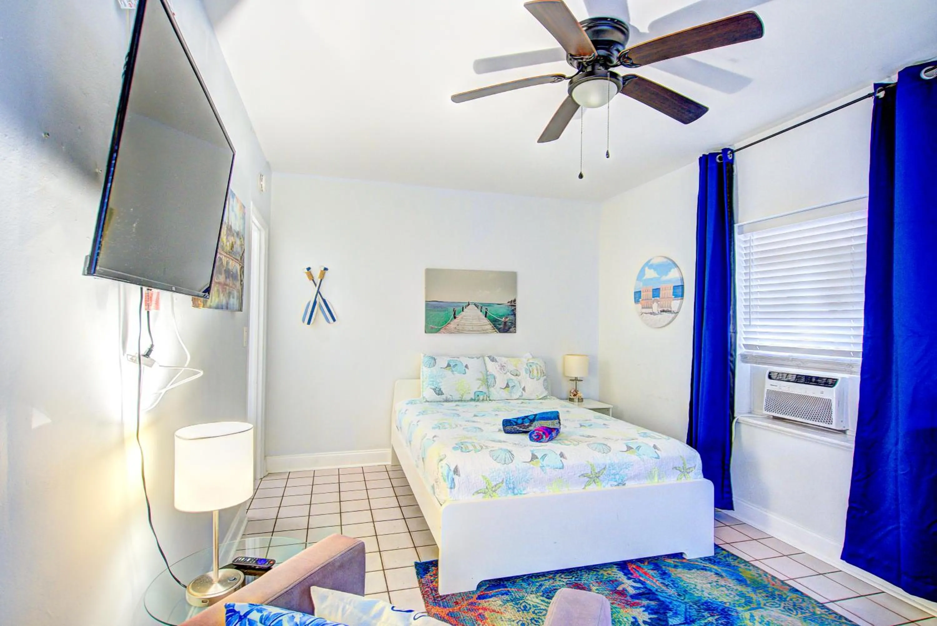 Photo of the whole room, Bed in Little Paris by the ocean self check in