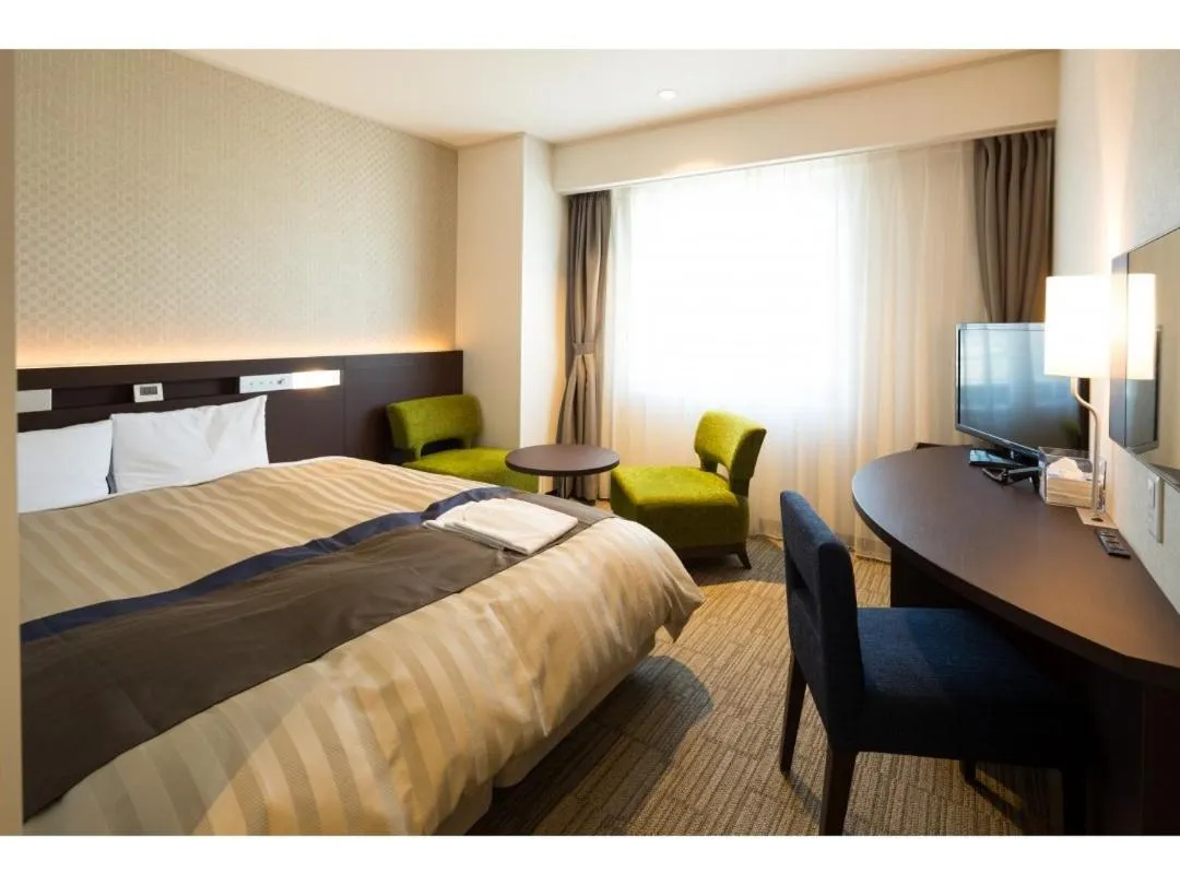 Photo of the whole room, Bed in Kochi Hotel