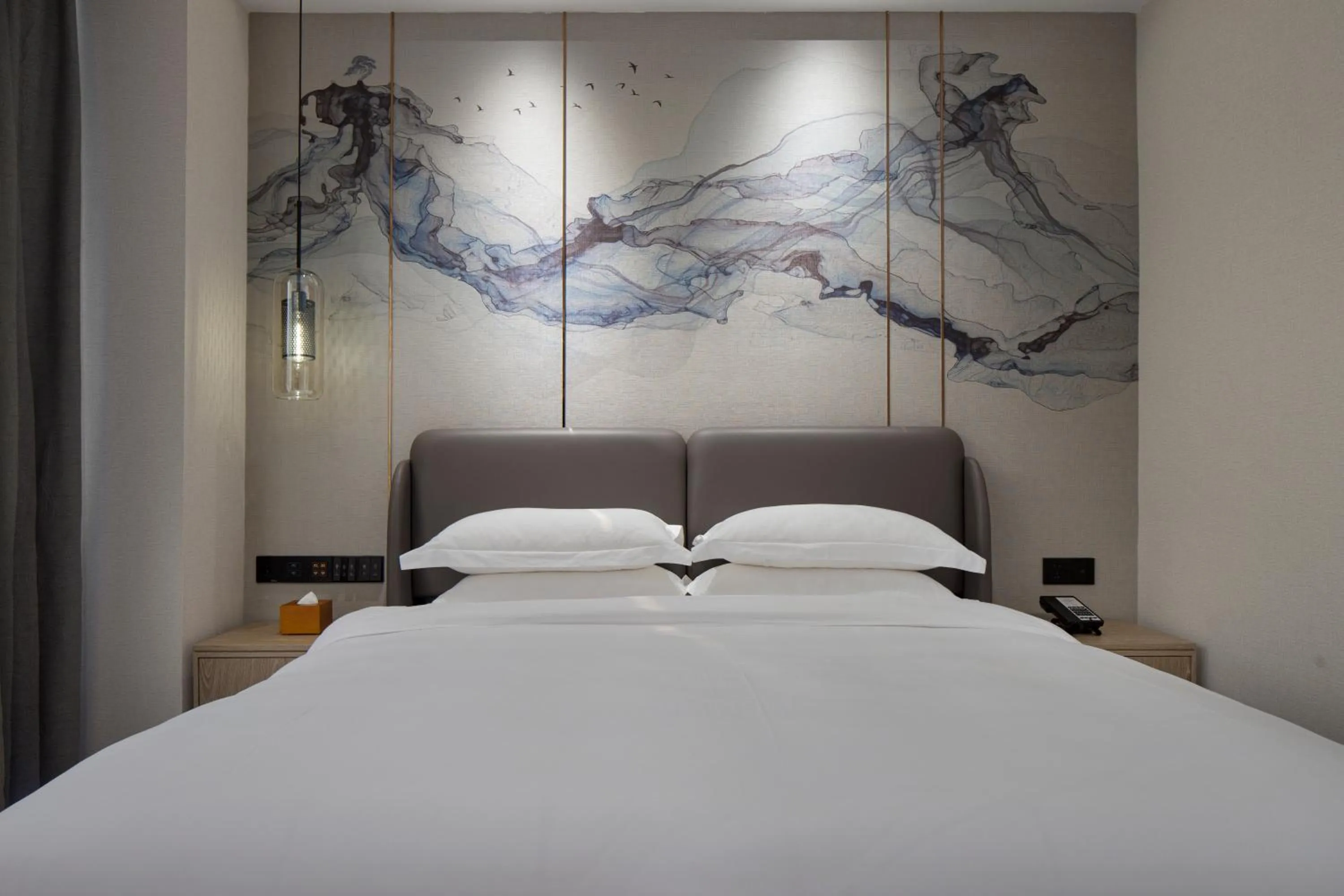 Bed in Paco Hotel Jinfeng Metro Guangzhou