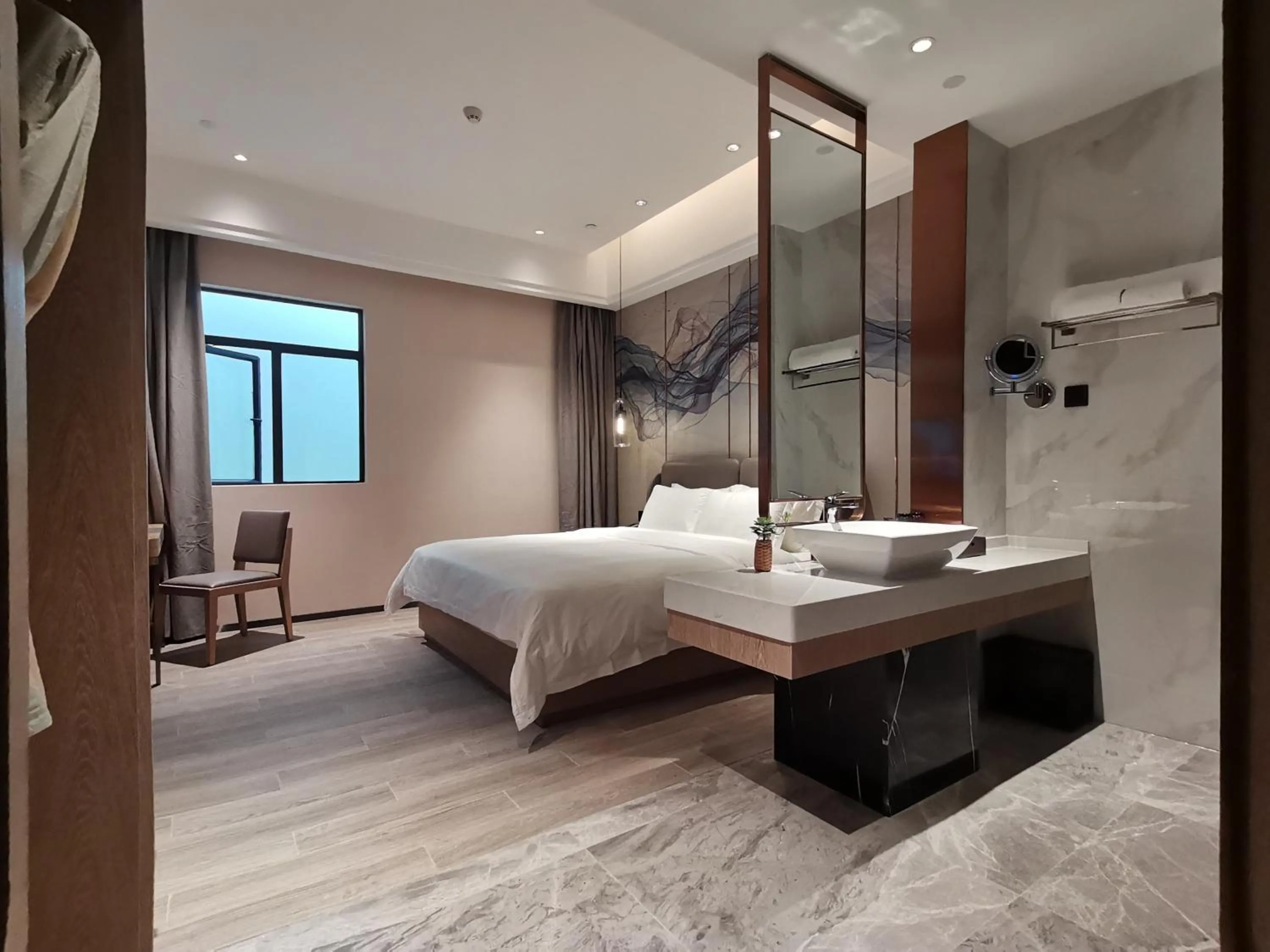 Bed in Paco Hotel Jinfeng Metro Guangzhou