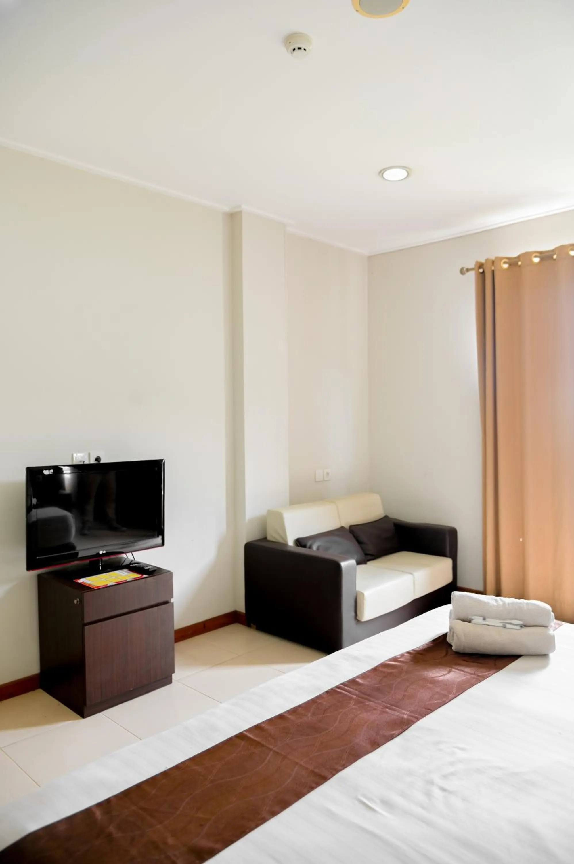 Bed in Hotel Bonero Residence