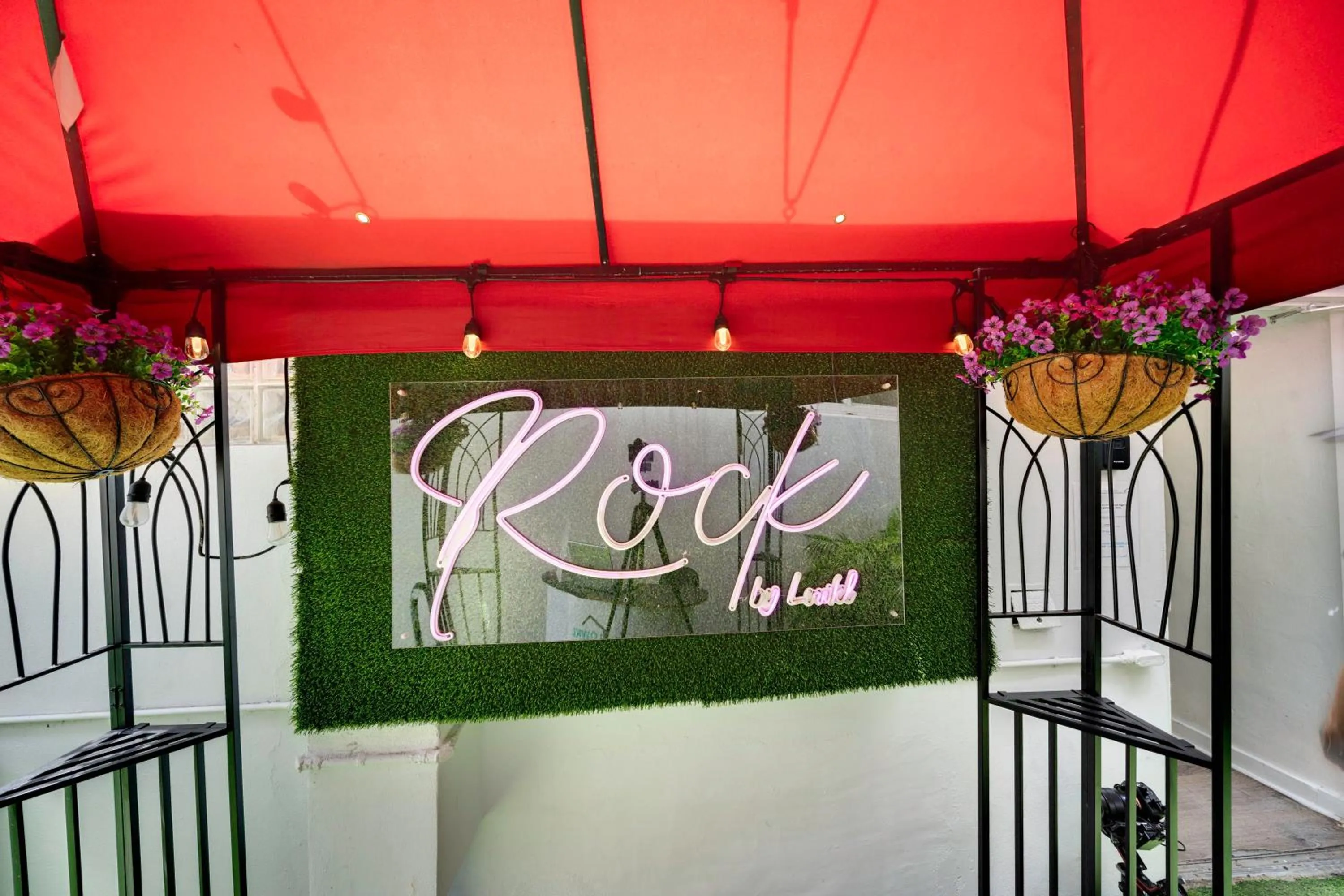 Property logo or sign in Rock Apartments by Lowkl