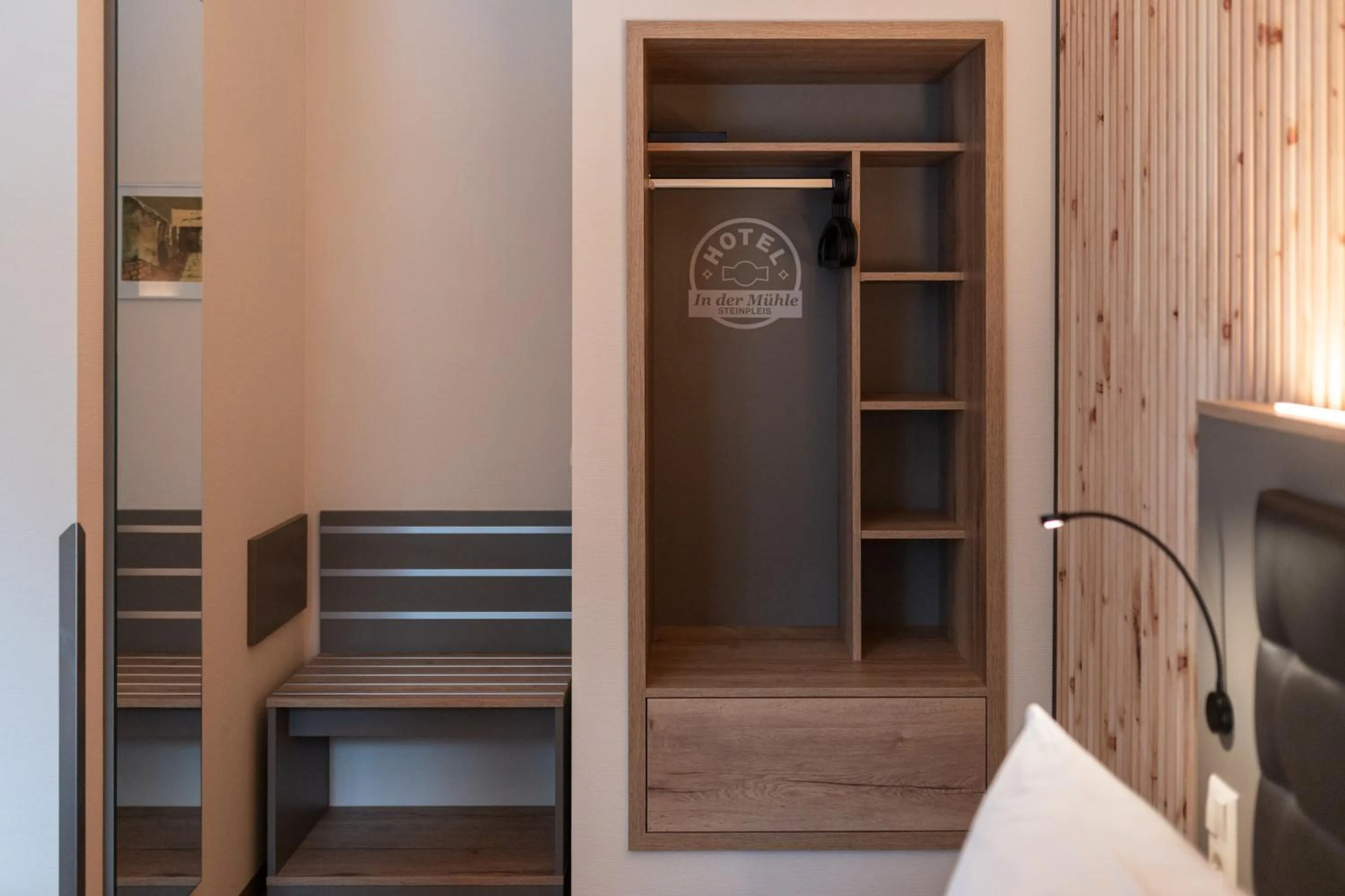 wardrobe, Bed in Hotel in der Mühle