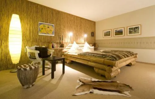 Seating area, Bed in Landhotel Binderhäusl Garni