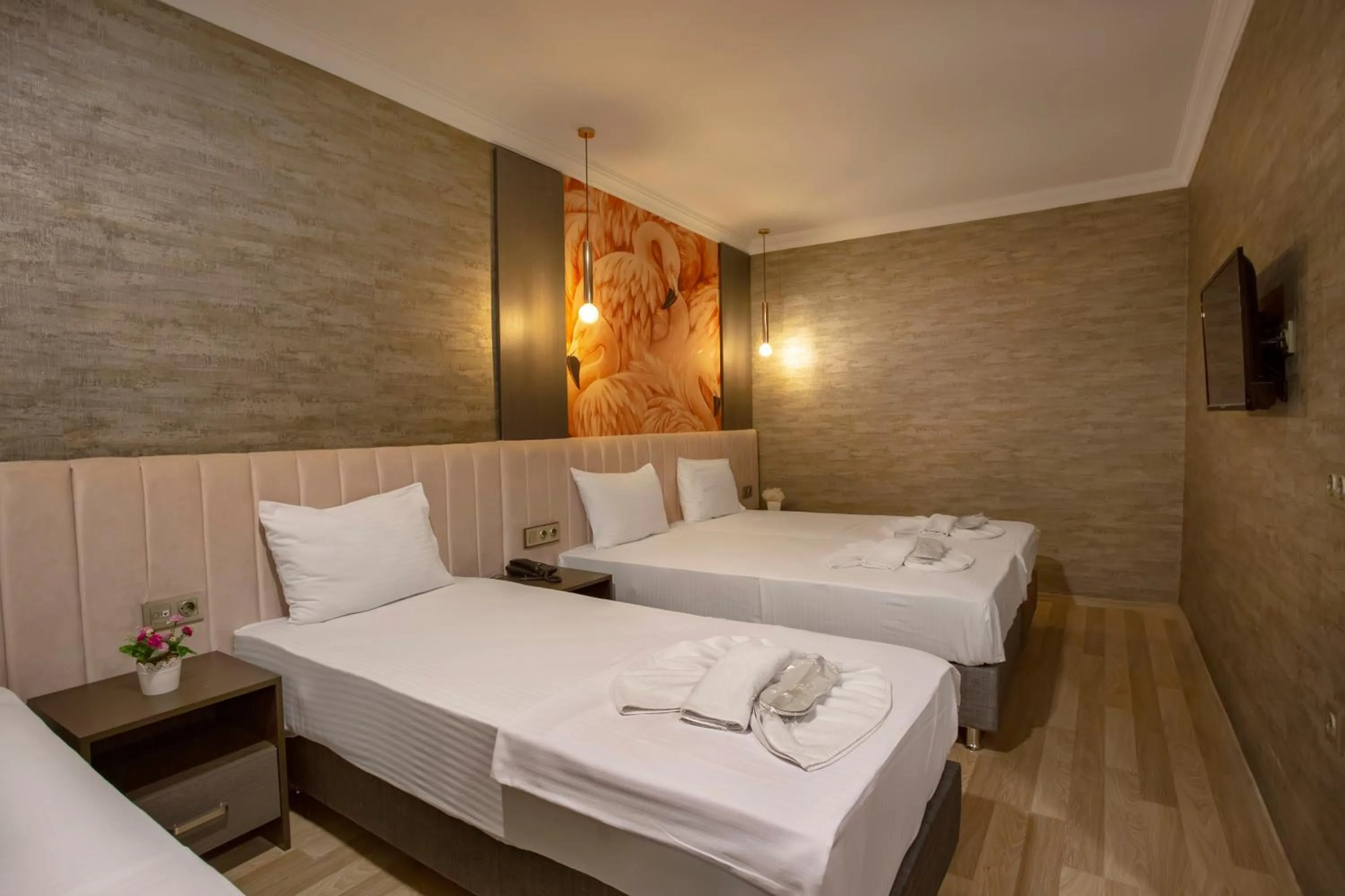 Bed in La Vie Suite Hotel