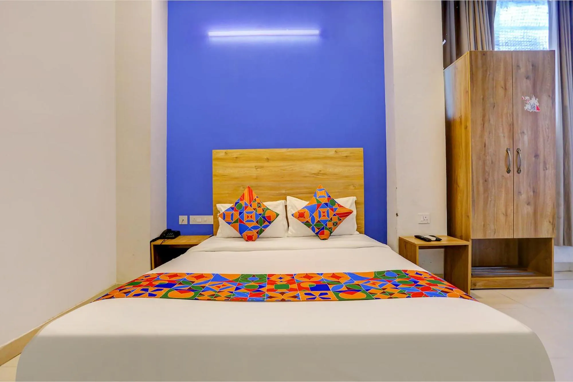 Bed in FabHotel Grand Capitol