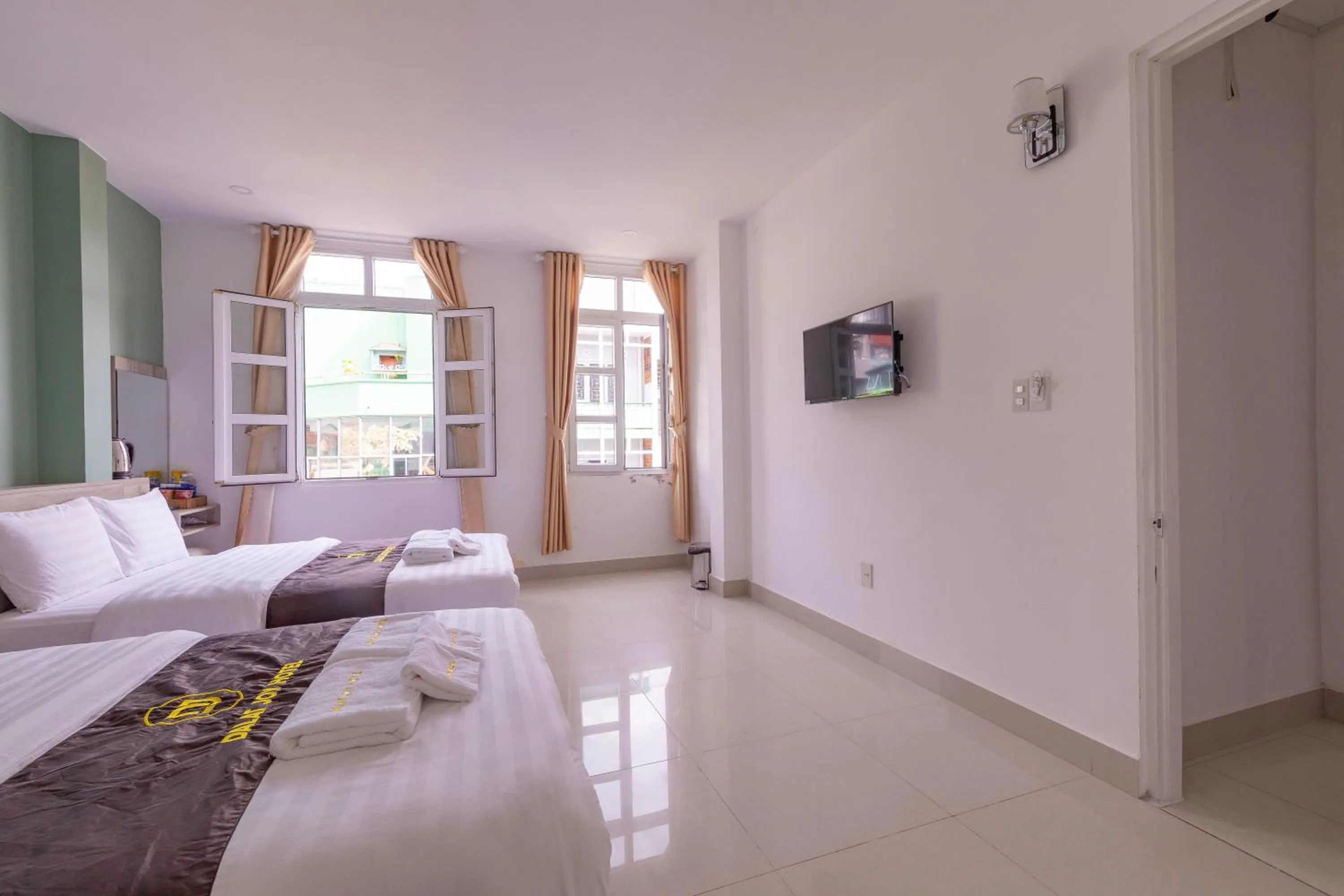 Bed in Dalat Joy Hotel