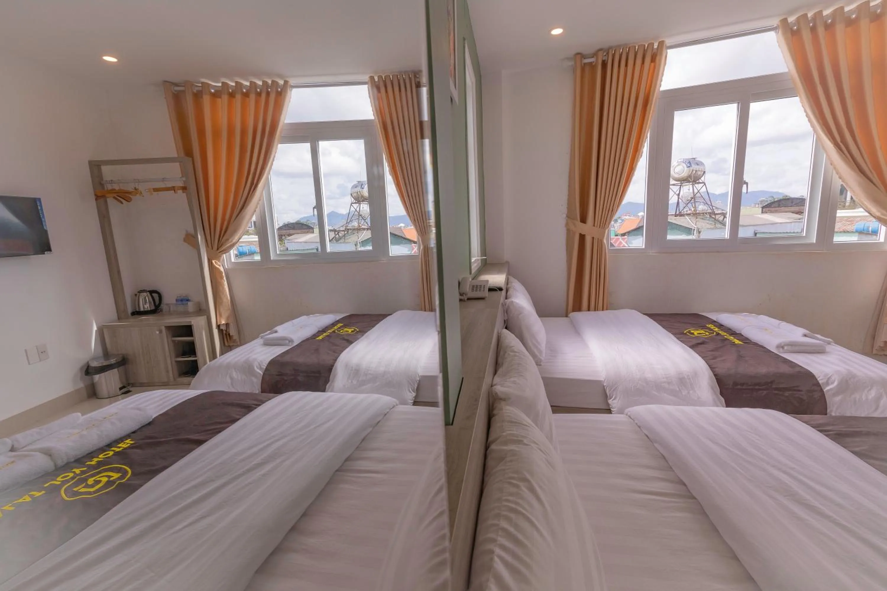 Bed in Dalat Joy Hotel