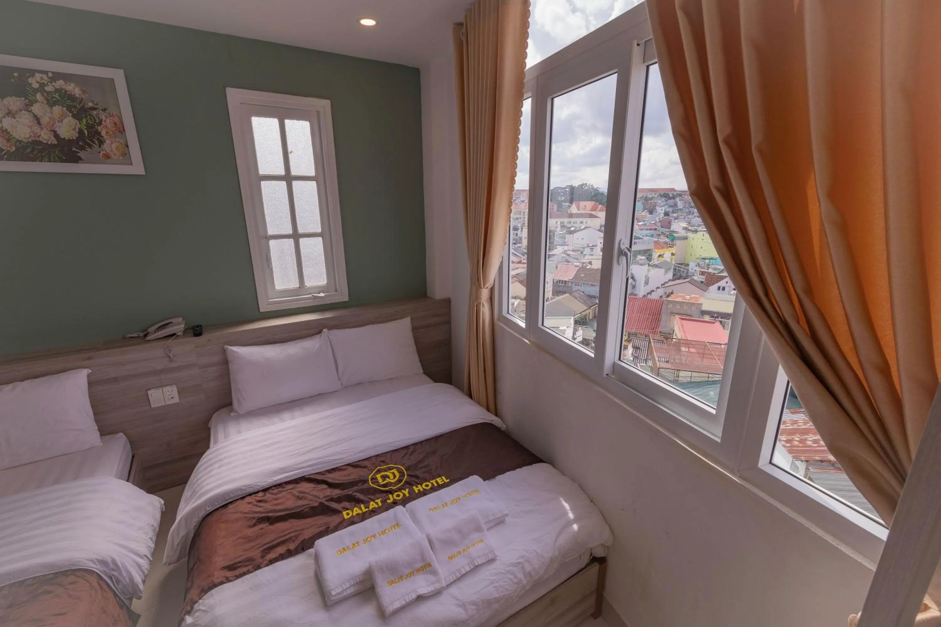 Bed in Dalat Joy Hotel