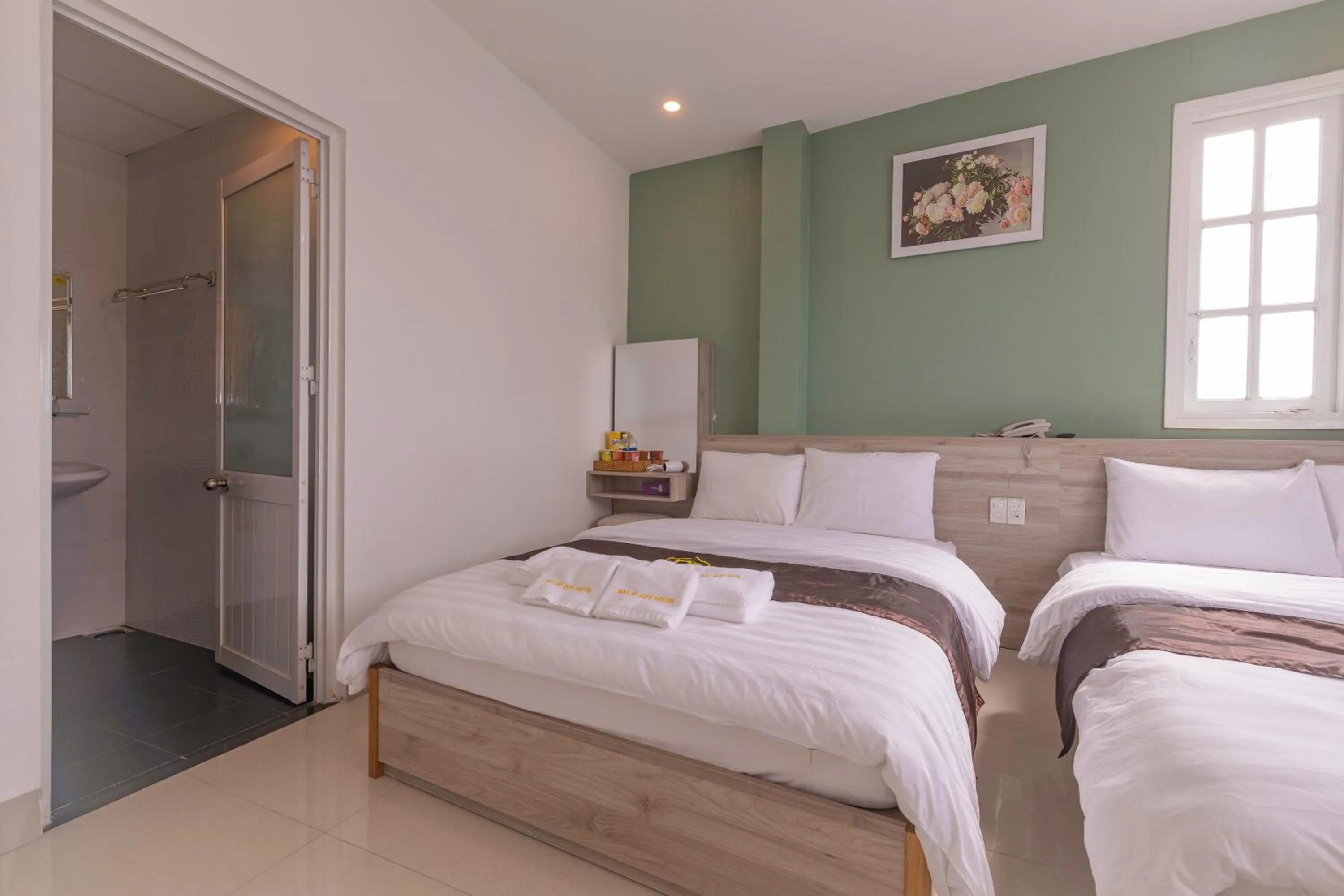 Bed in Dalat Joy Hotel