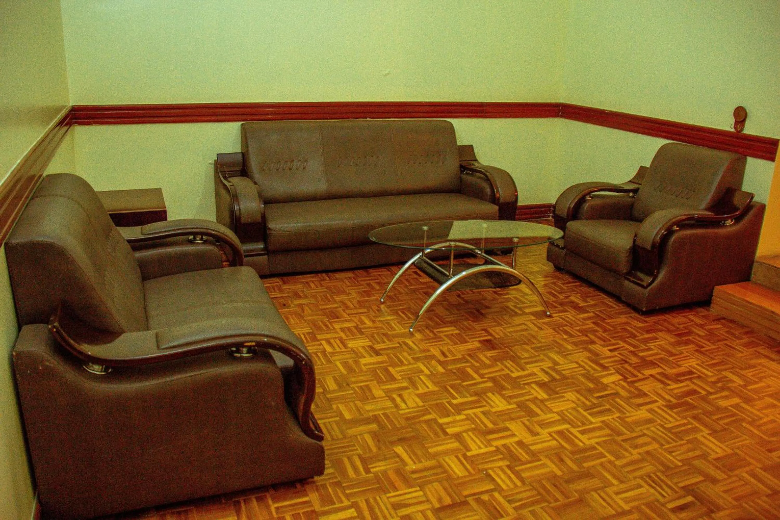 Living room in New Charity Hotel International