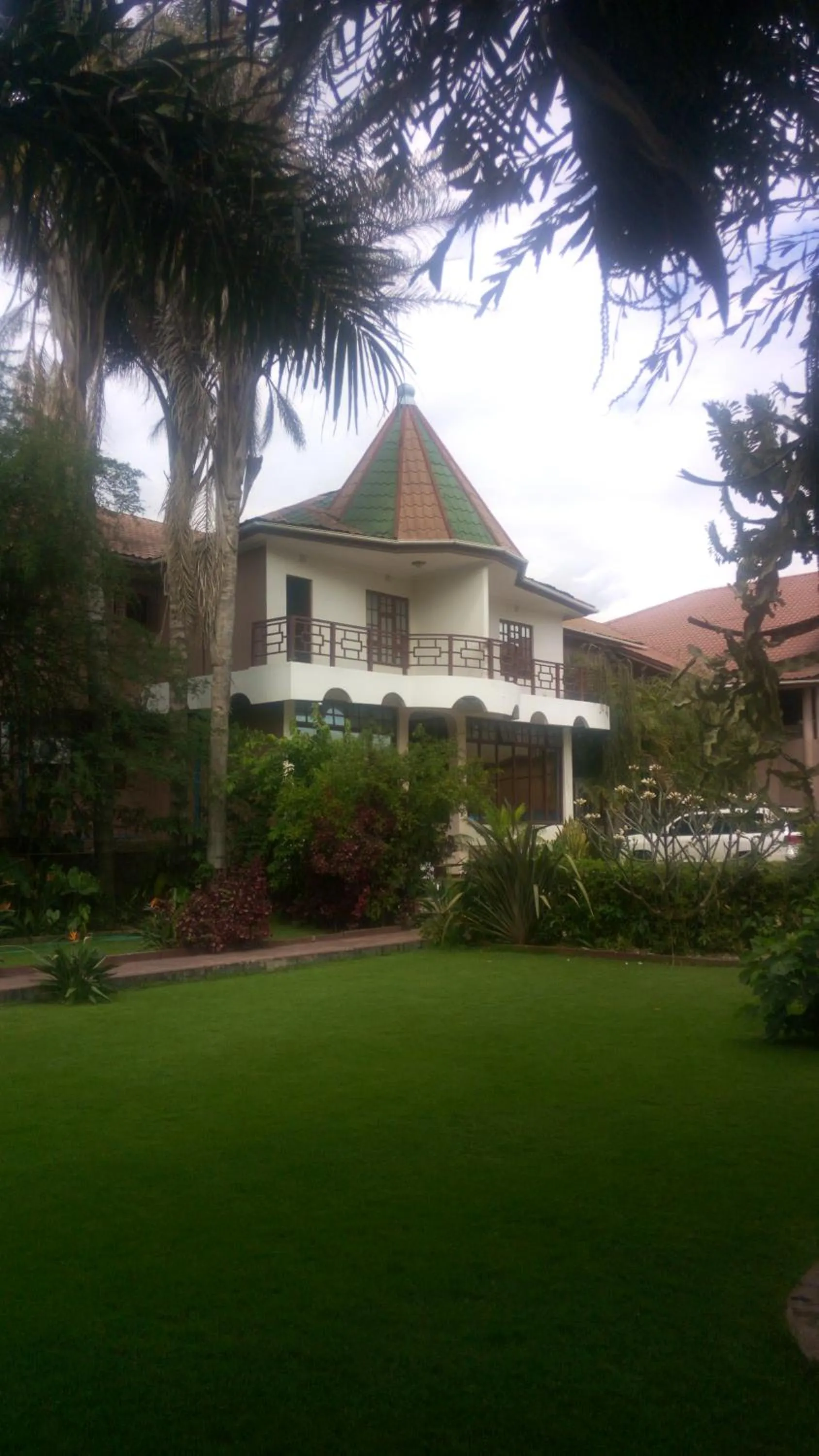 Property building in New Charity Hotel International