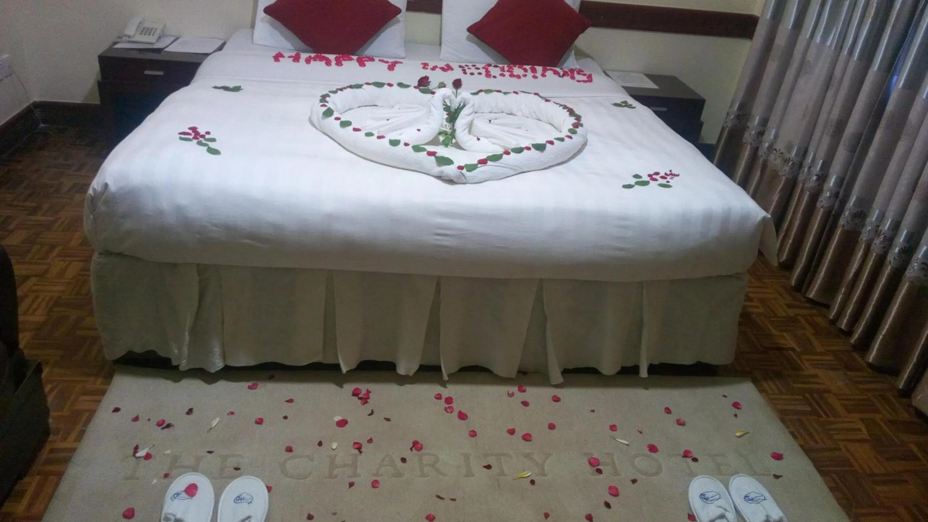 Bed in New Charity Hotel International