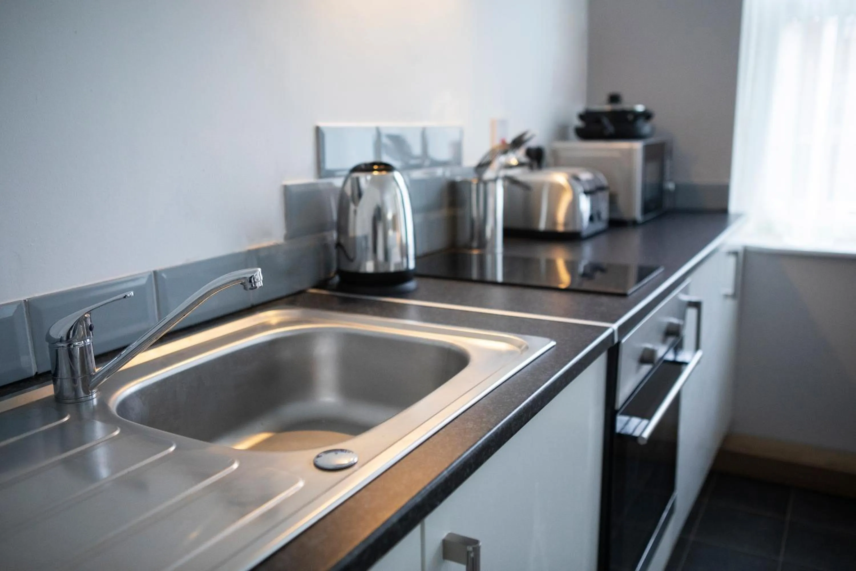 Kitchen or kitchenette in Wellington Apartments