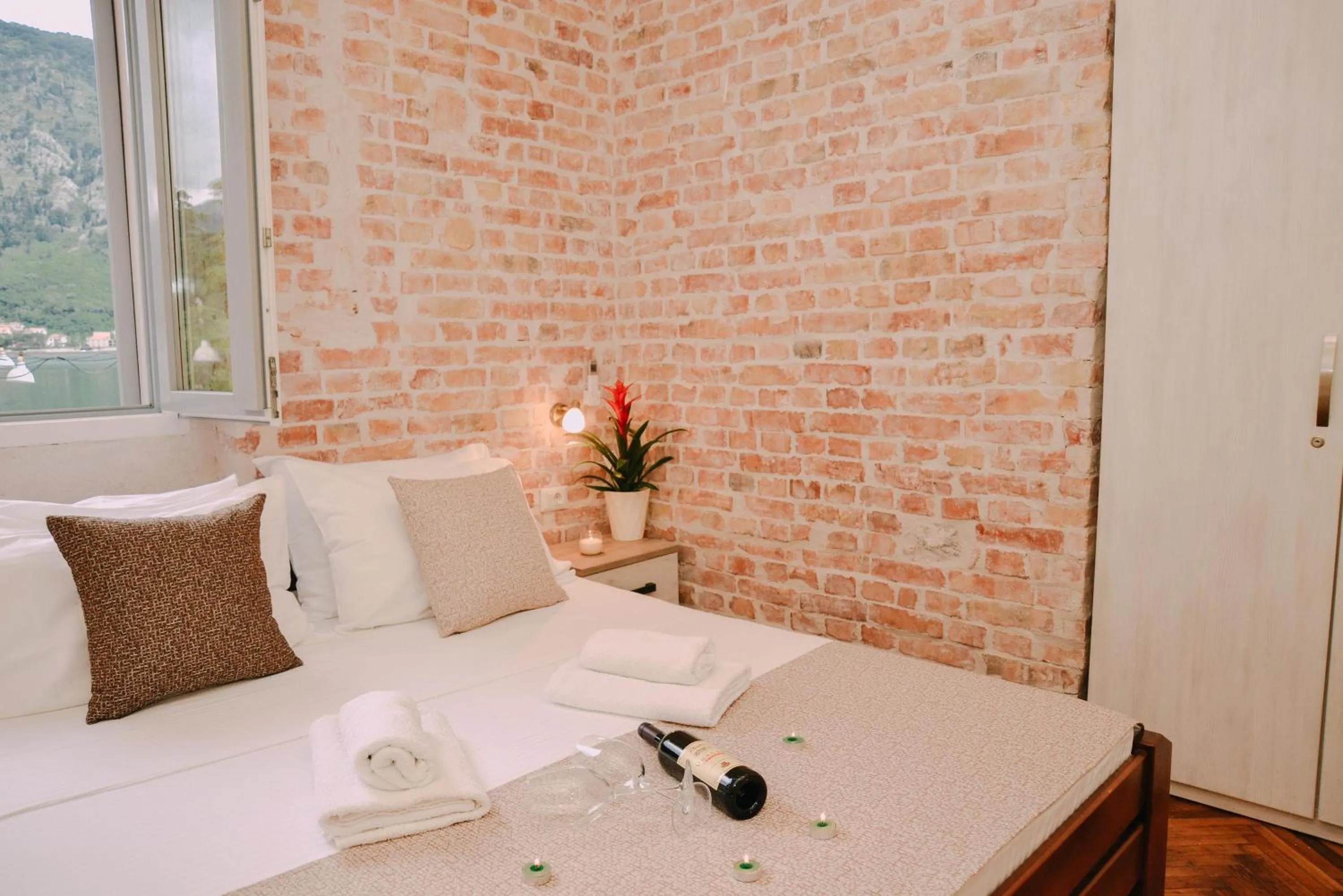 Bed in Step to Kotor bay Guesthouse