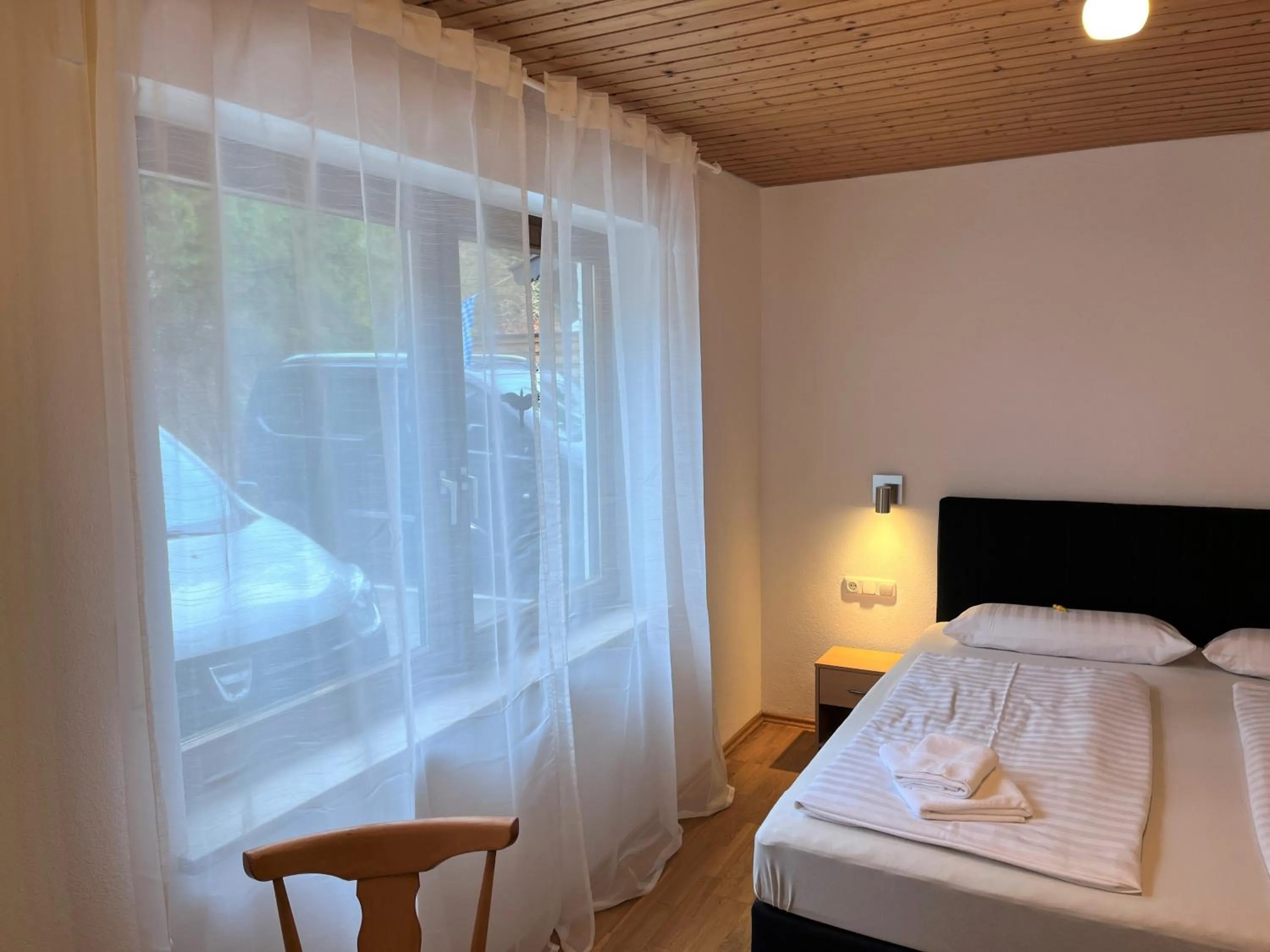 Bedroom, Bed in Gästehaus Forggensee