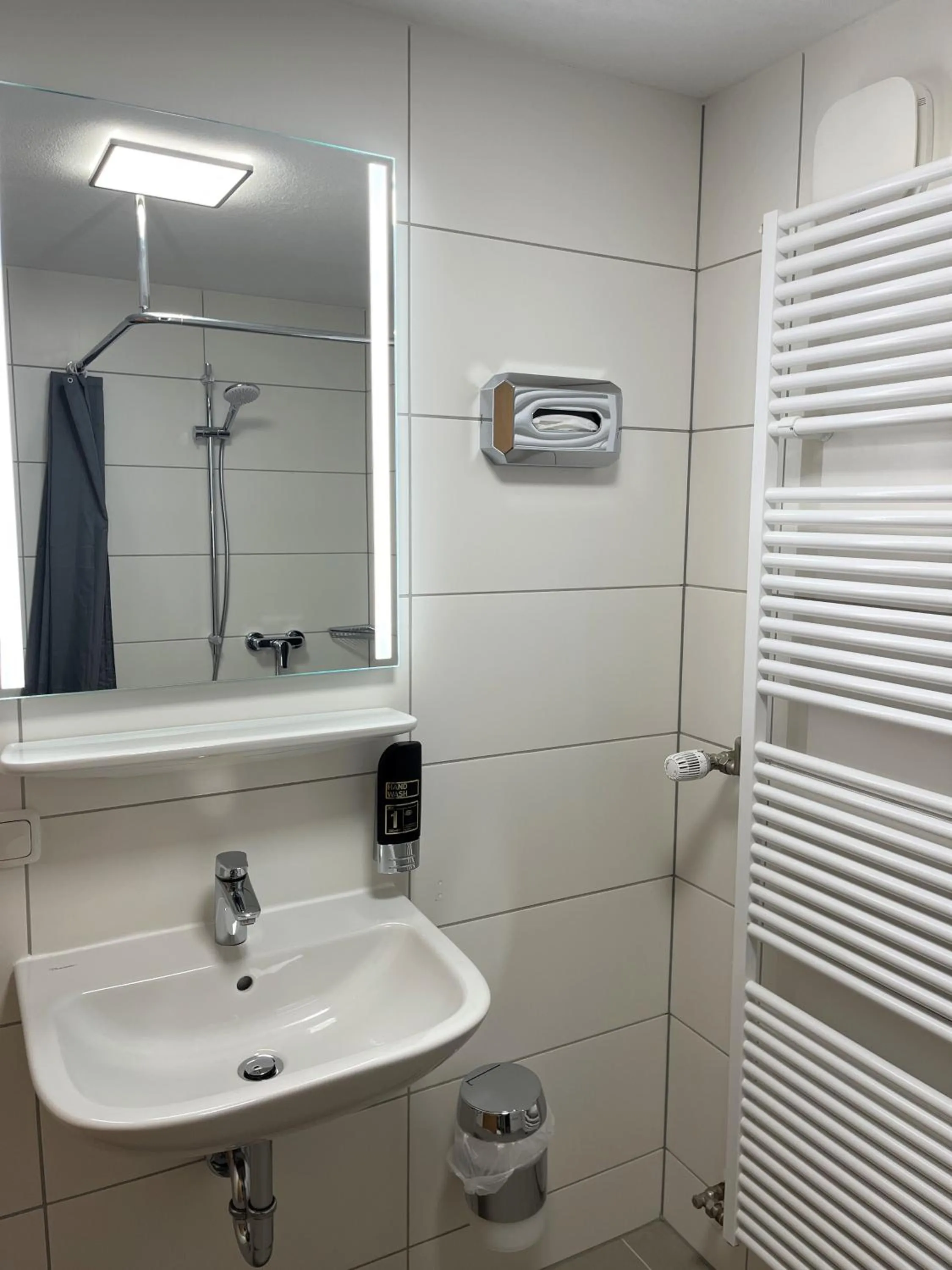 Bathroom in Gästehaus Forggensee