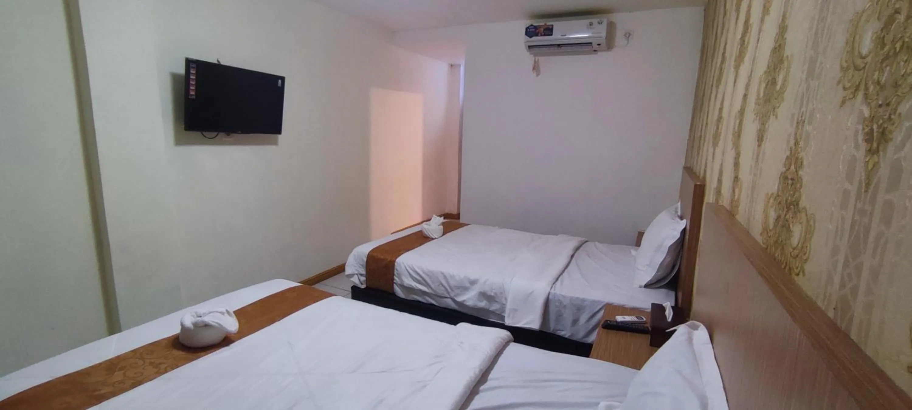 Bed in Votel Hotel De'Pratnya Kediri