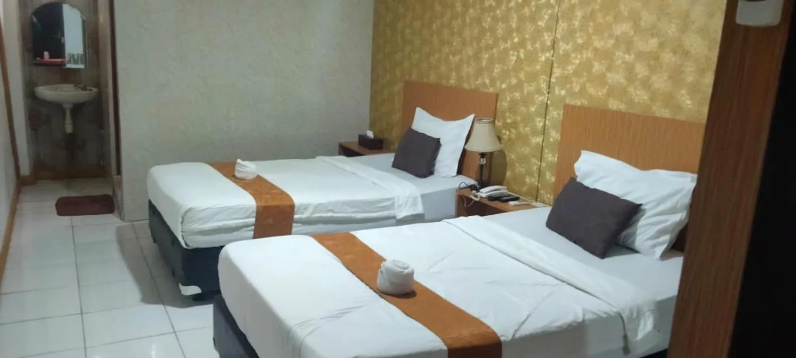 Bed in Votel Hotel De'Pratnya Kediri